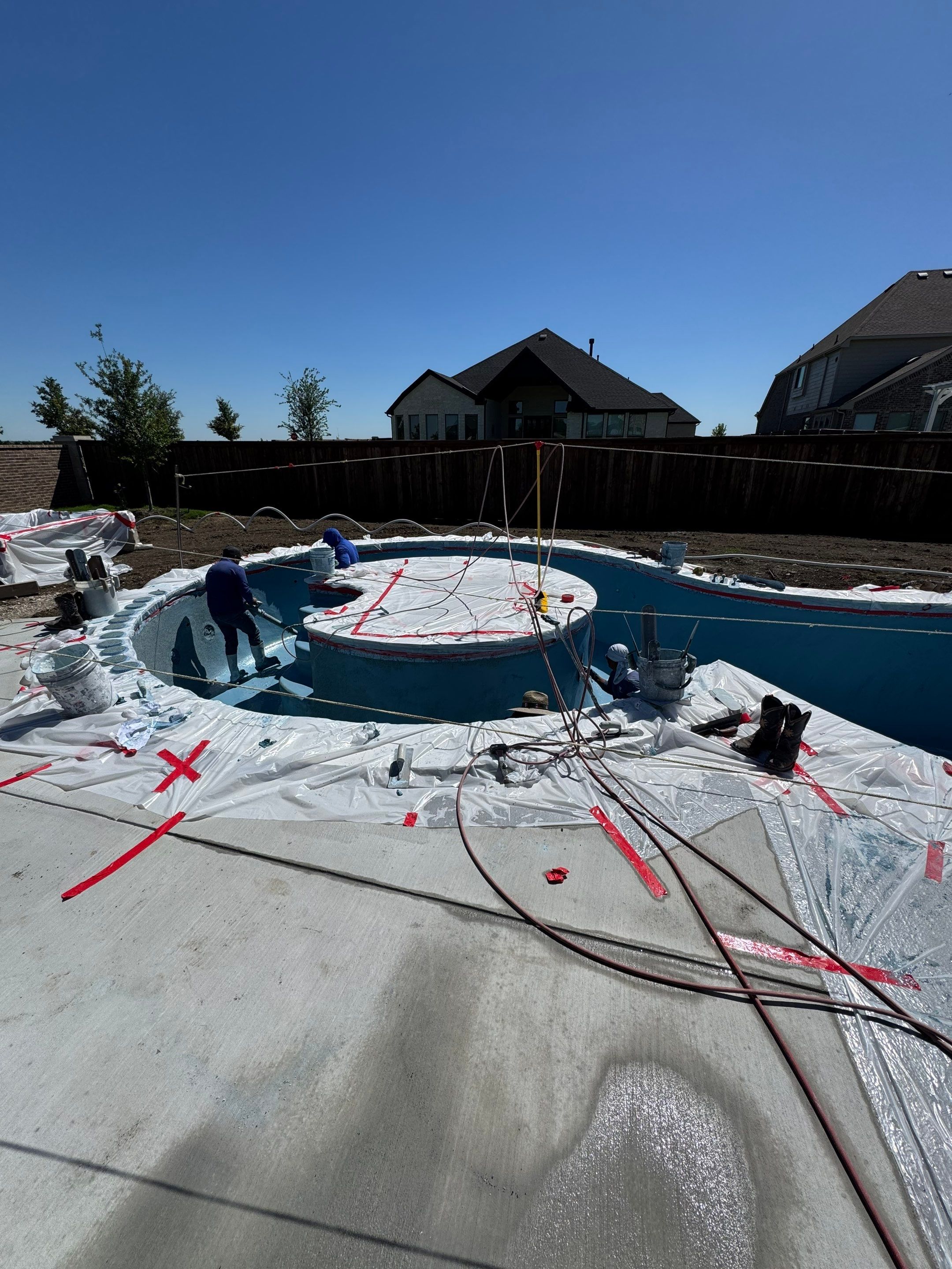 Geometric Pool with Round Raised Spa by Pinnacle Pools and Spas - DFW