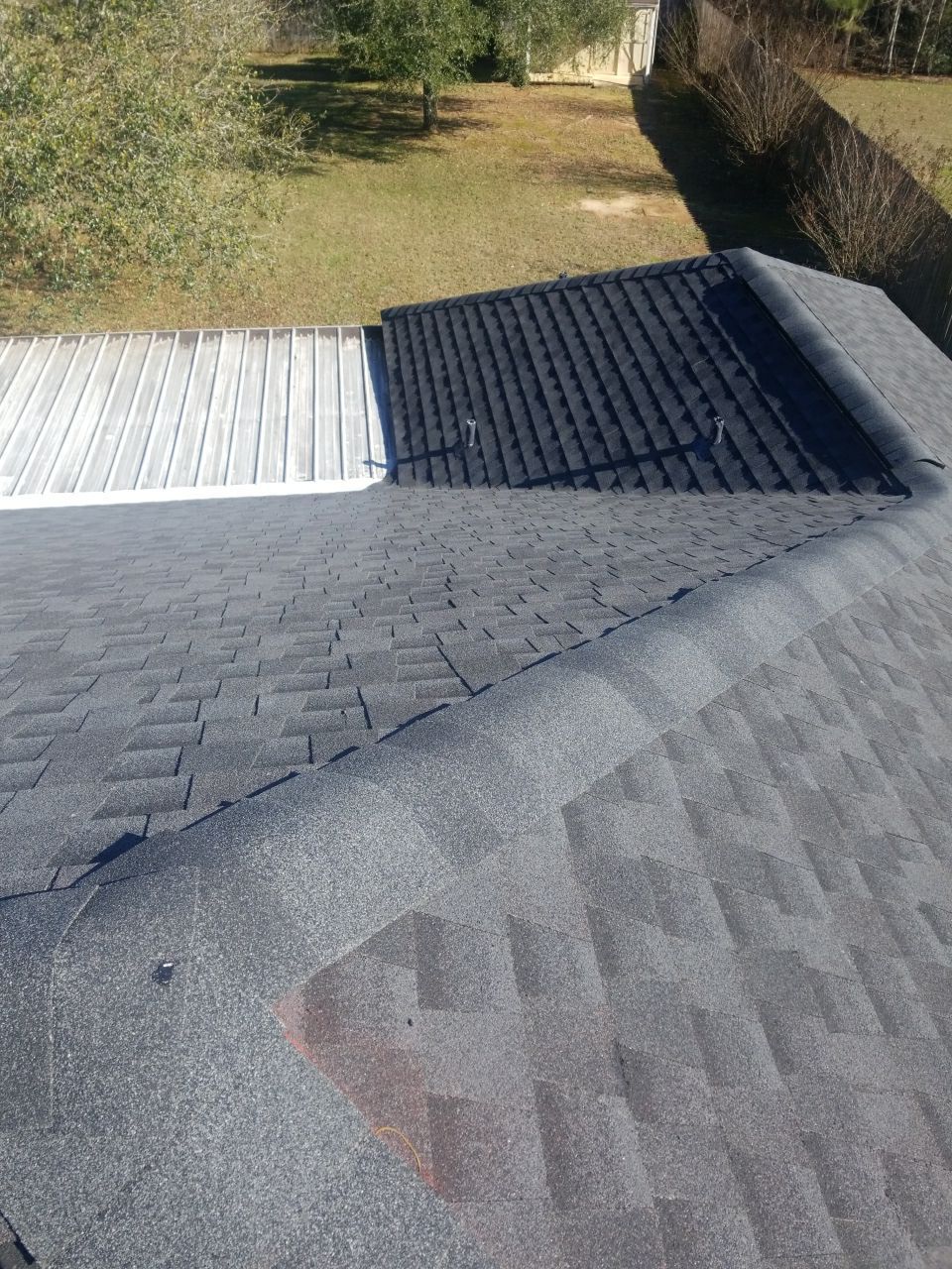 Residential Roofing Installation using Roof Replacement by American Roofing & Construction LLC
