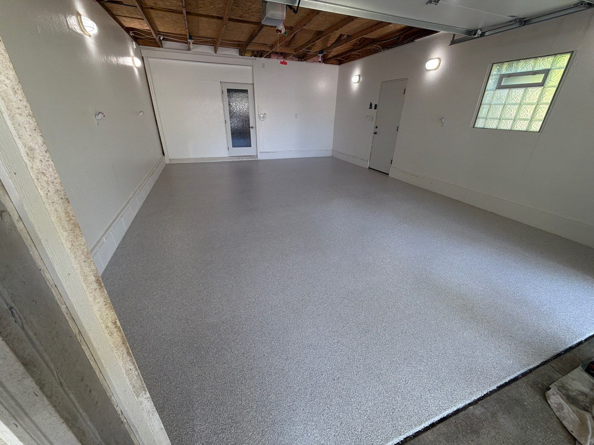 Custom Epoxy Flake Garage Floor Installation in Muskegon by Gordon Painting