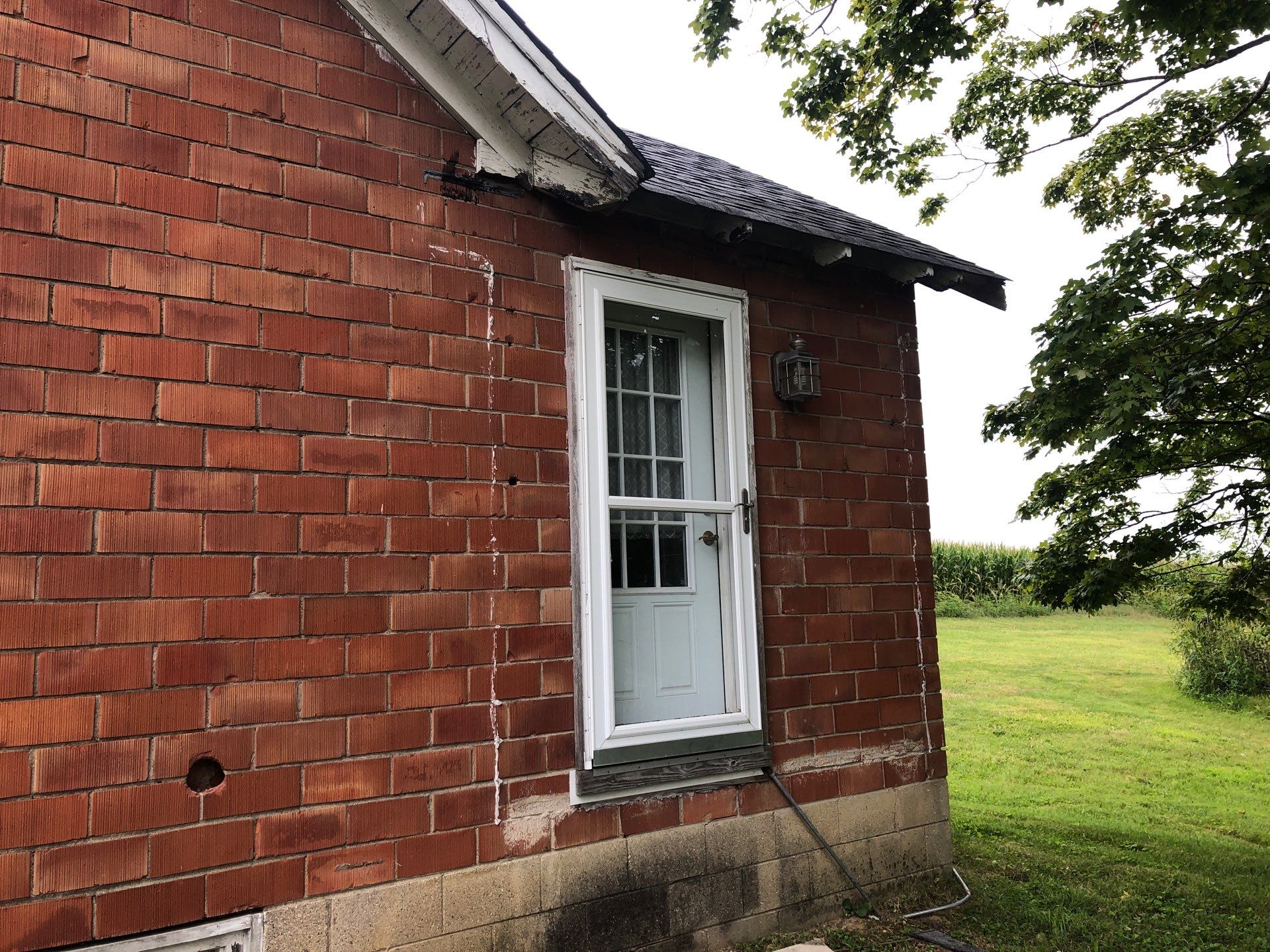 Old Farmhouse Restoration by 317 Roofing & Restorations