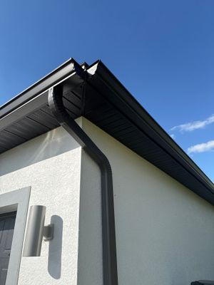 Dark Seamless Gutters and Downspouts in Cape Coral FL