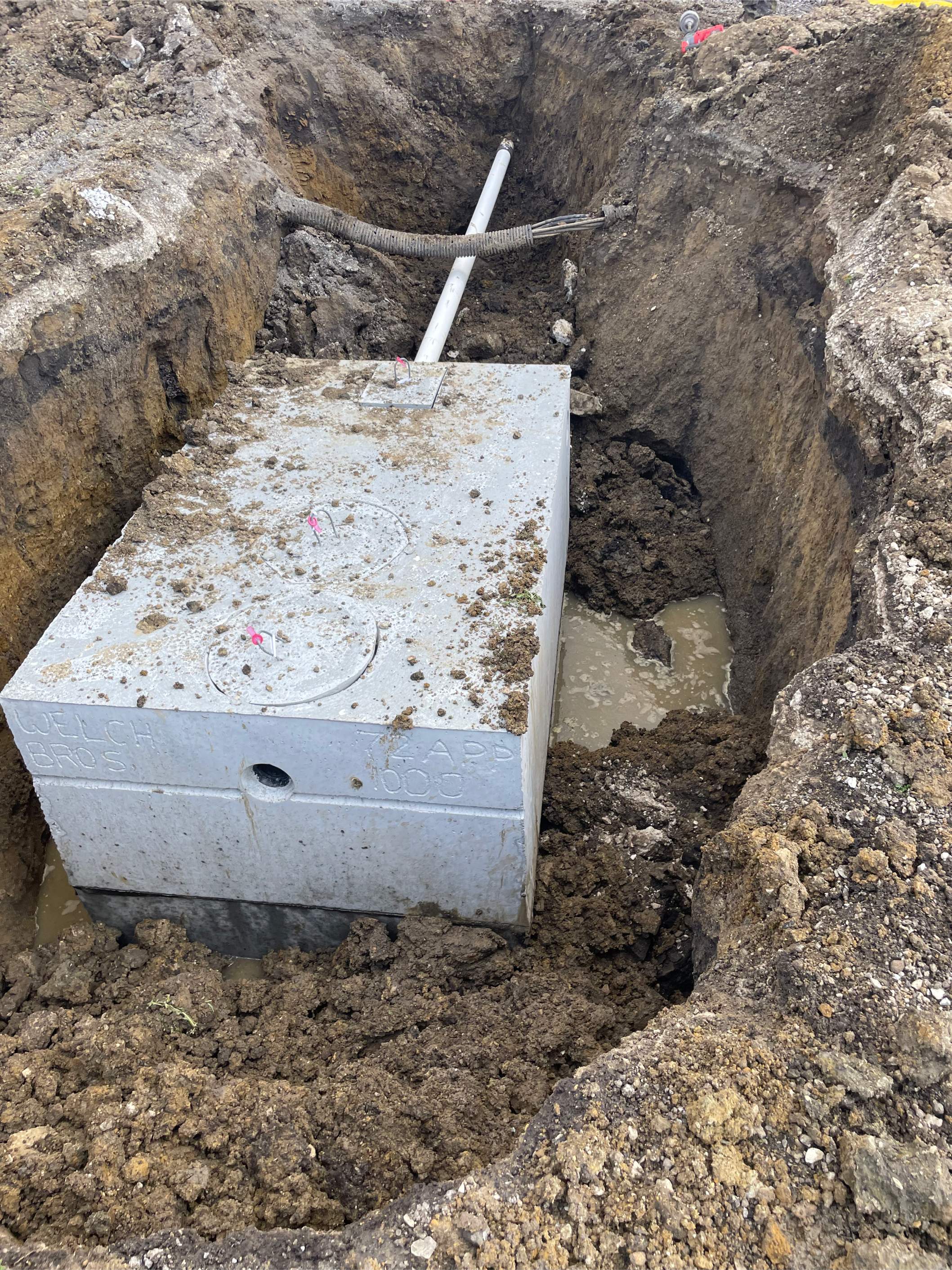 1000 Gallon Concrete Tank Replacement and Header Line/Distribution Box Replacement by Allied Water Services