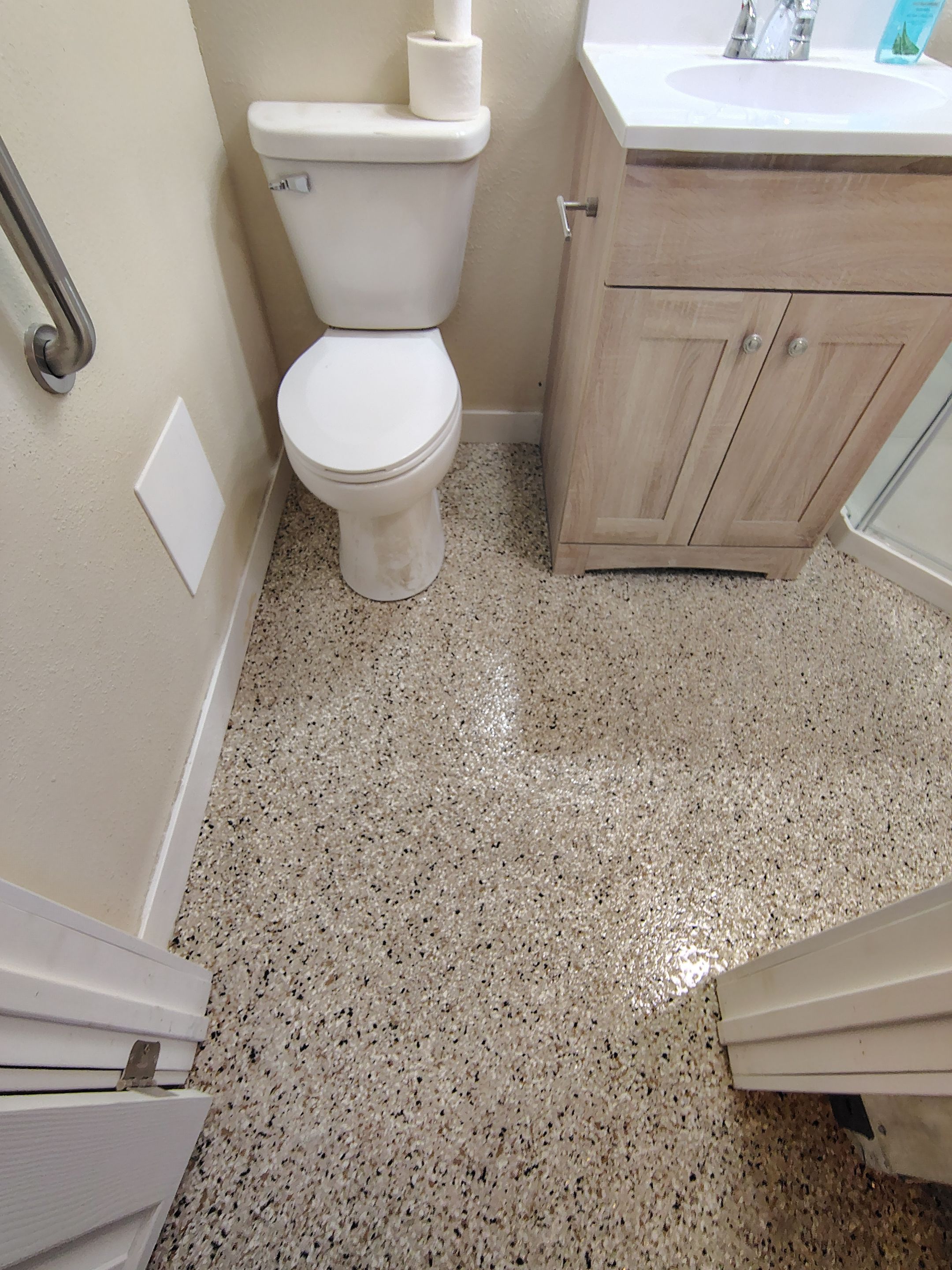 Comprehensive Basement Concrete Floor Coating and Crack Repair in Sioux Falls by Select Painting, Coatings & Garage Cabinets