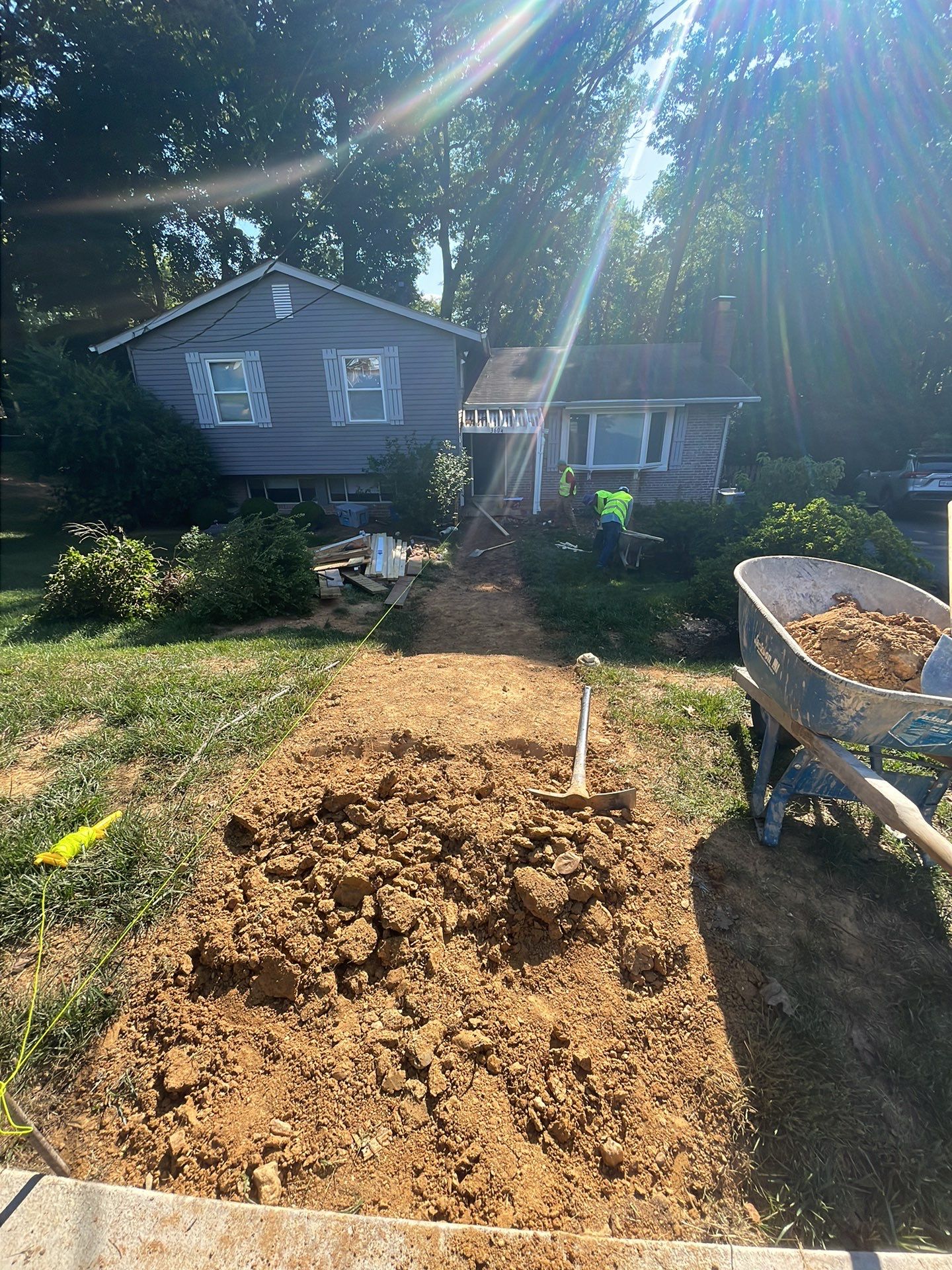 New walkway with stairs and a new front porch by Fairfax Contractors, LLC