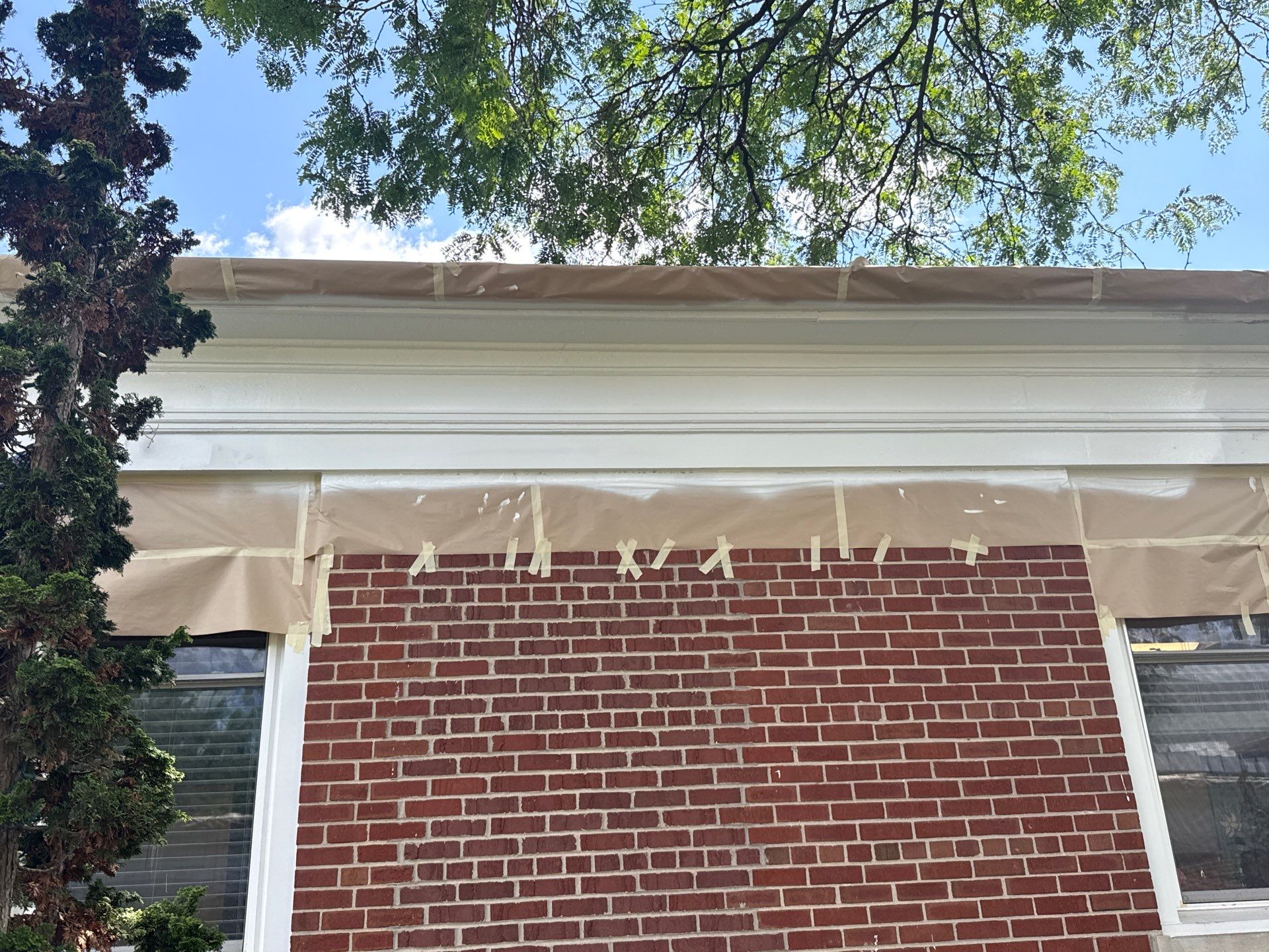 Commercial Wood Trim Restoration and Gutter Replacement in Birmingham by Top Shelf Painter