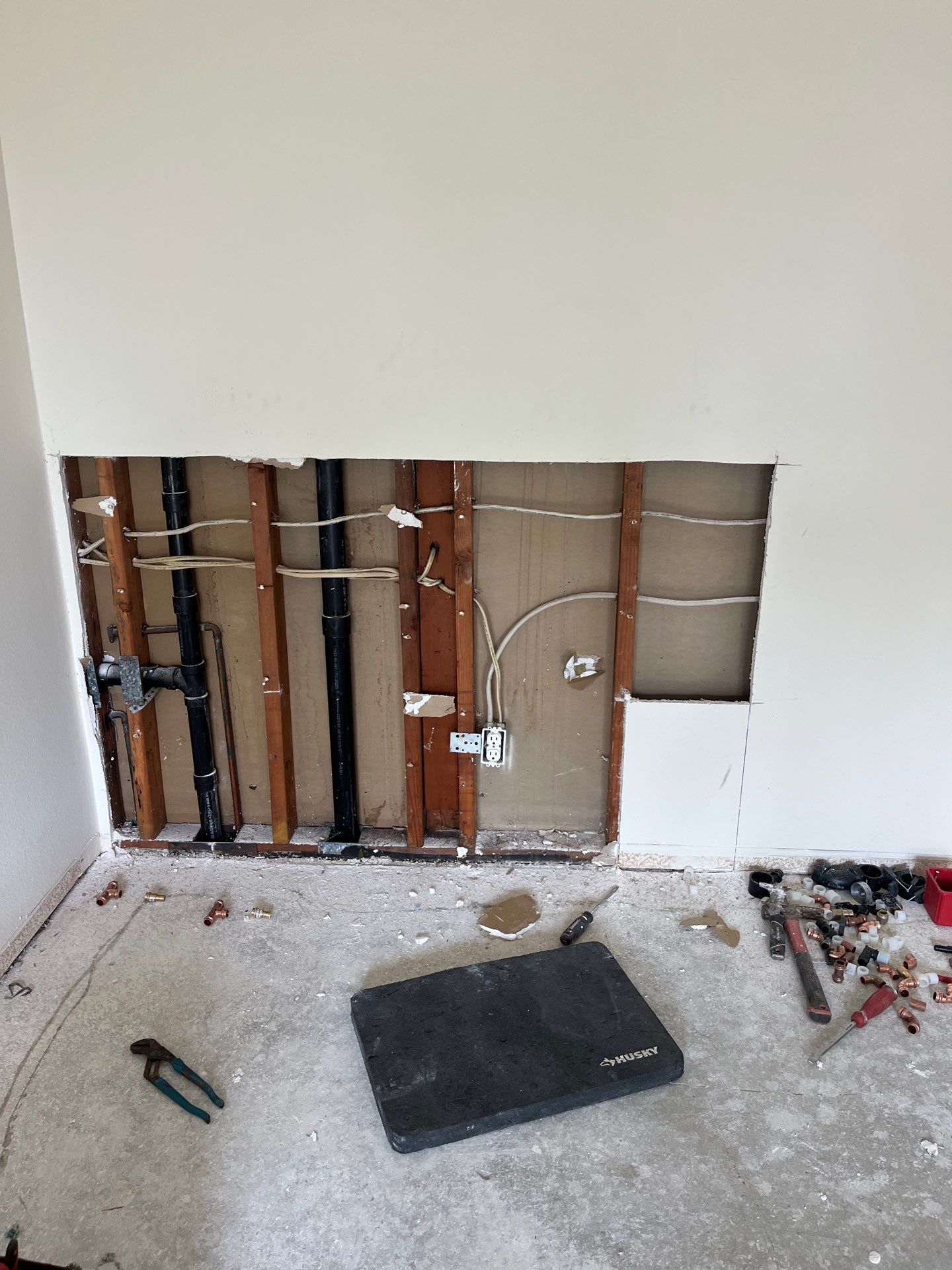 Scope of Work: Installation of Shower, Toilet, Plumbing, Kitchen Sink, and Fixtures by Us Plumbing 