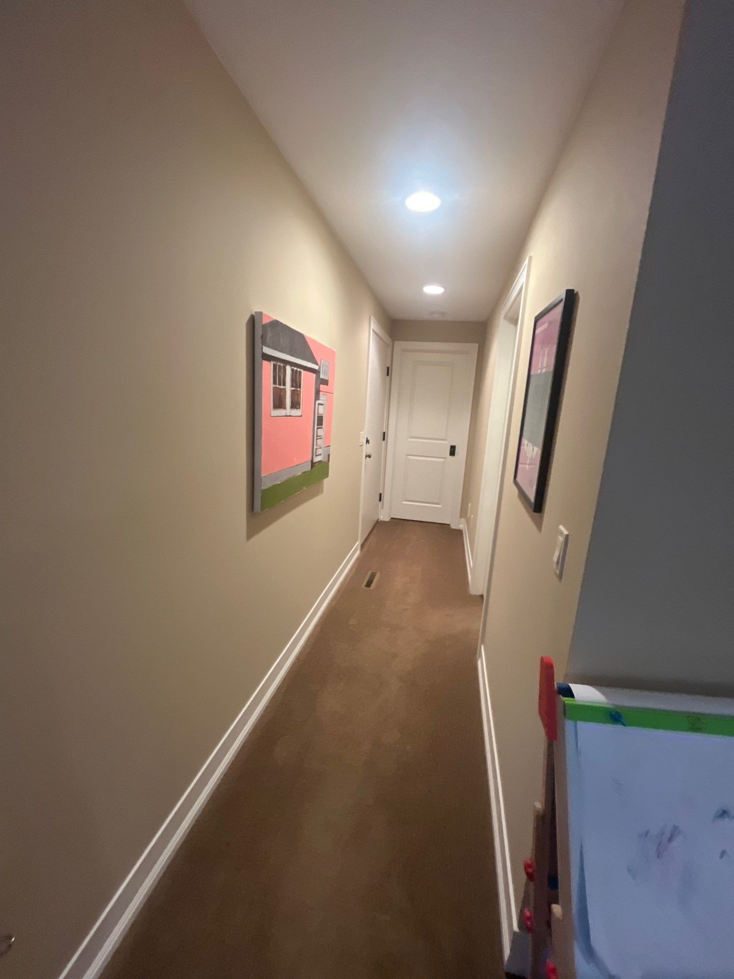 Sioux Falls Interior Painting with Custom Wainscoting and Decorative Wallpaper by Select Painting, Coatings & Garage Cabinets