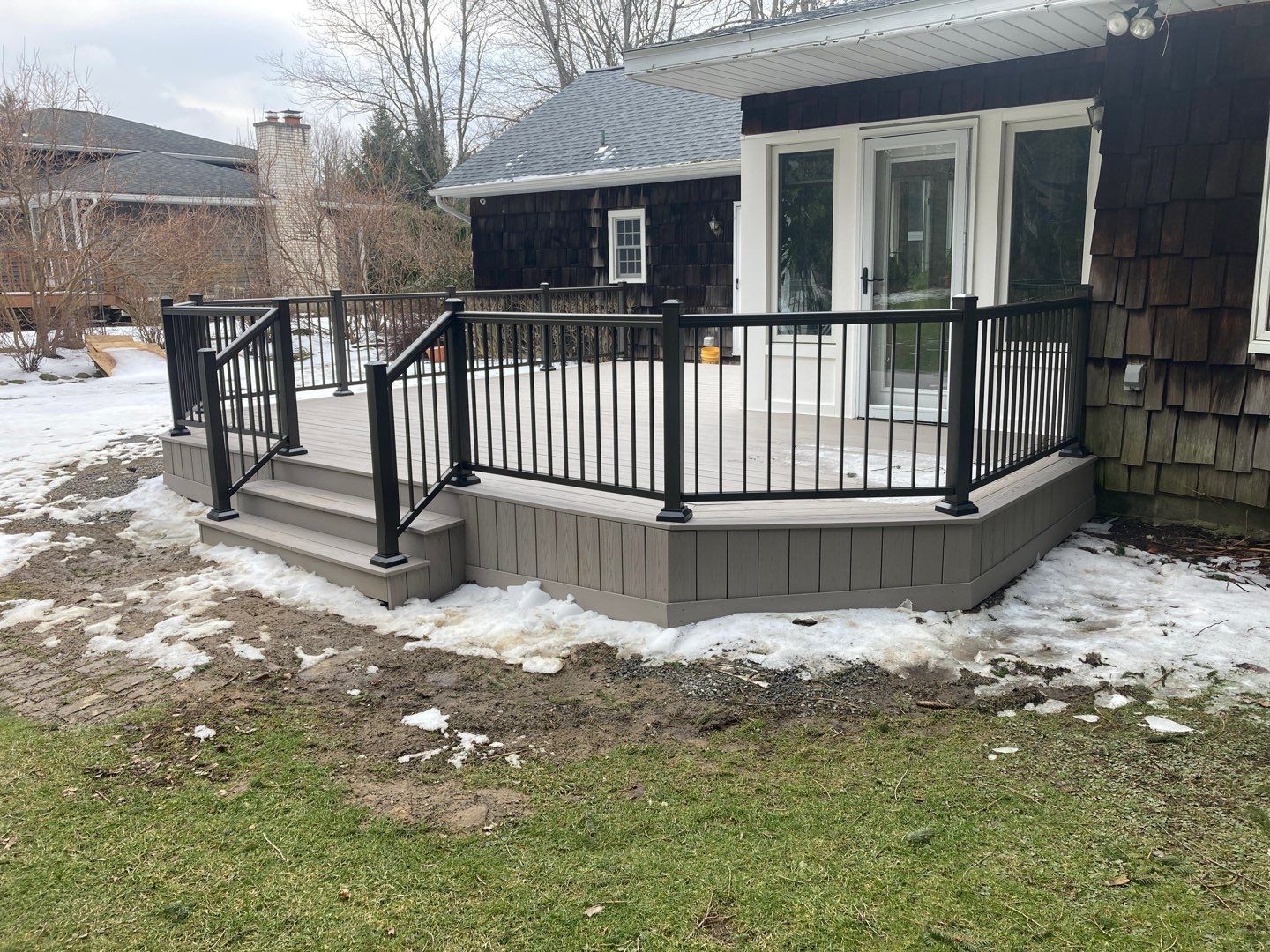 Deck and Stamped Concrete by Ivy Lea Construction