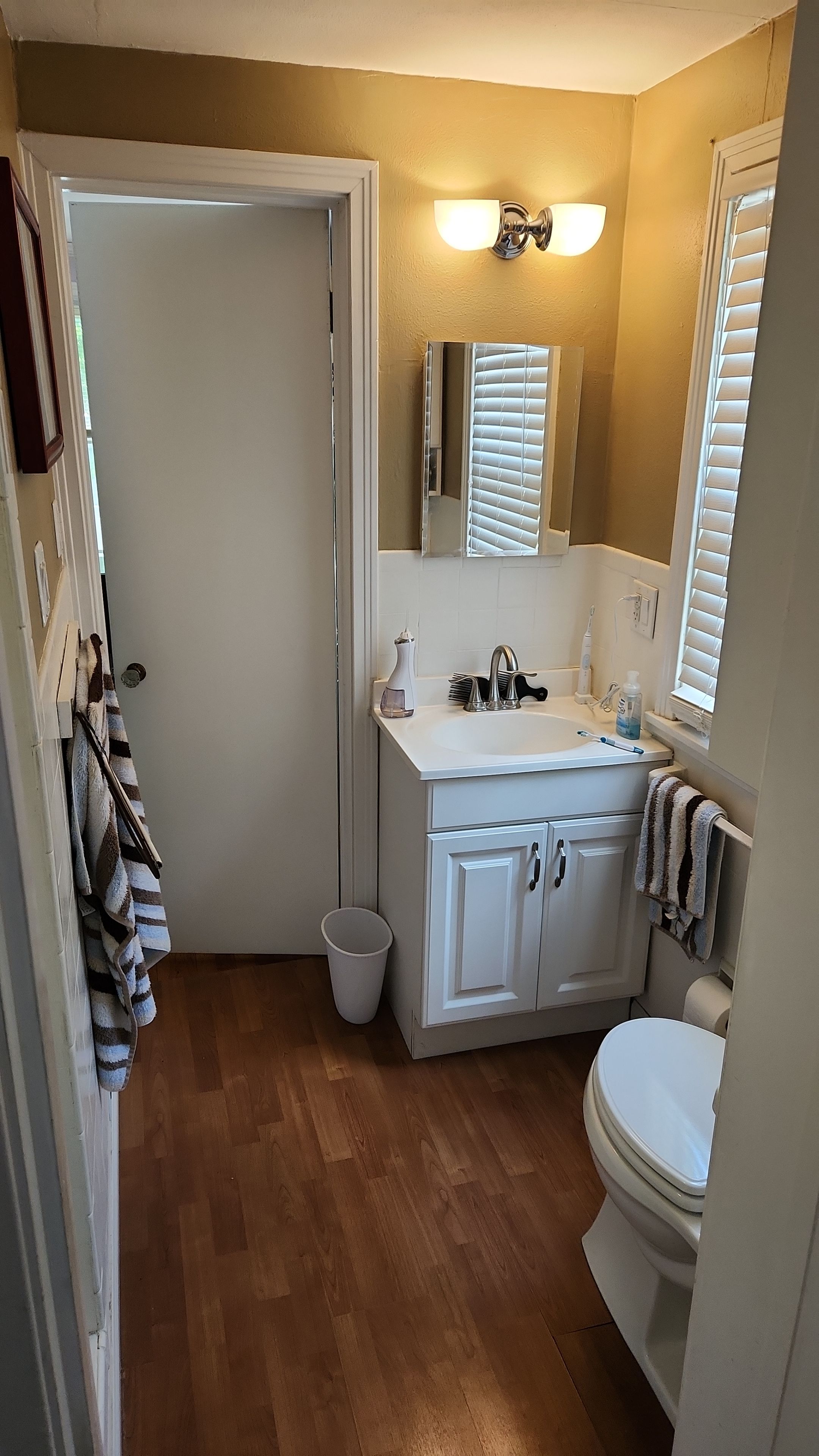 Full bathroom, tile shower, tile floor, tile wainscoting by The Shower Company