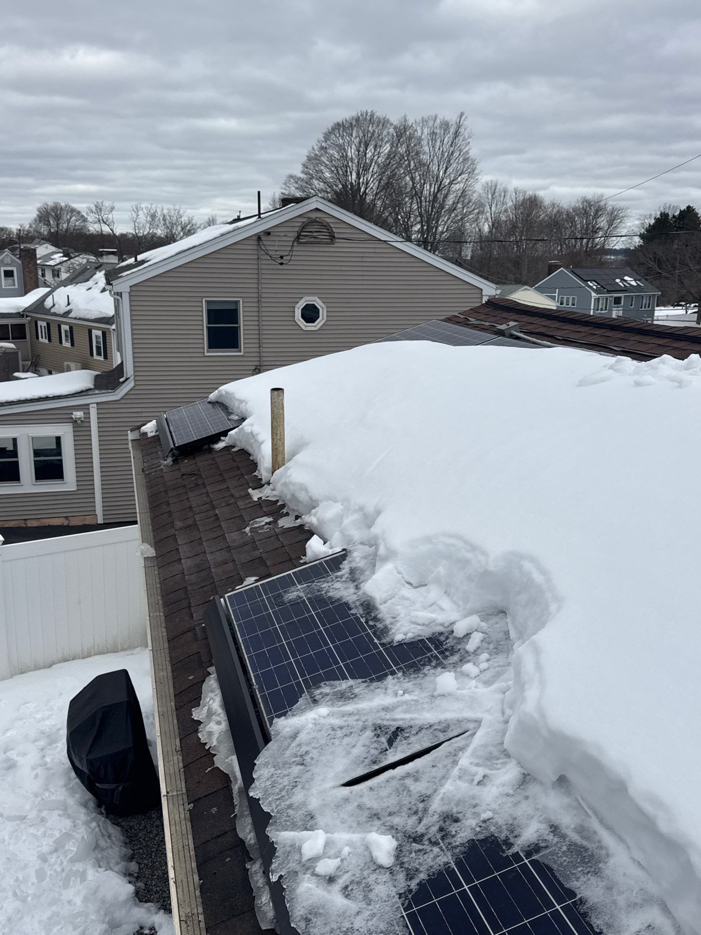 Ice Dam Removal & Snow Removal in Woburn, MA by Mighty Dog Roofing of Greater Middlesex County