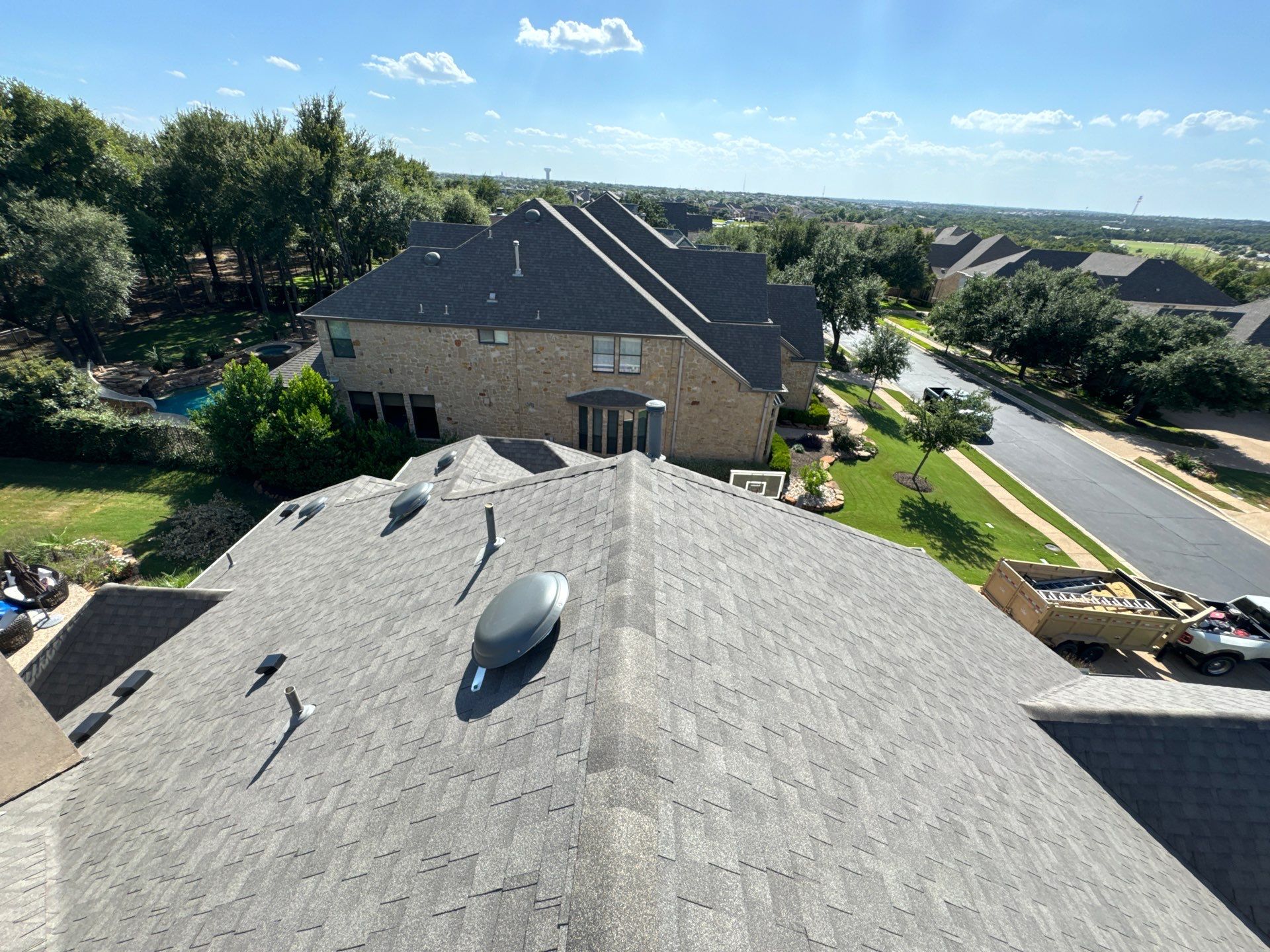 Residential Roofing Installation using IKO, Cambridge in Weathered Wood by Oakwood Roofing and Construction, LLC