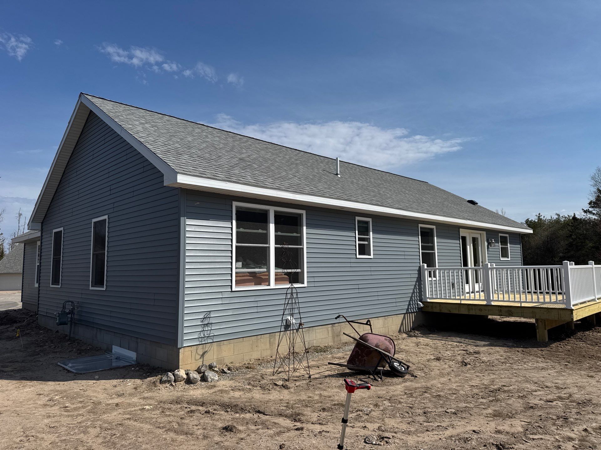 Gutter System Installation for New Home Construction in Petoskey by Rainbow Seamless Systems