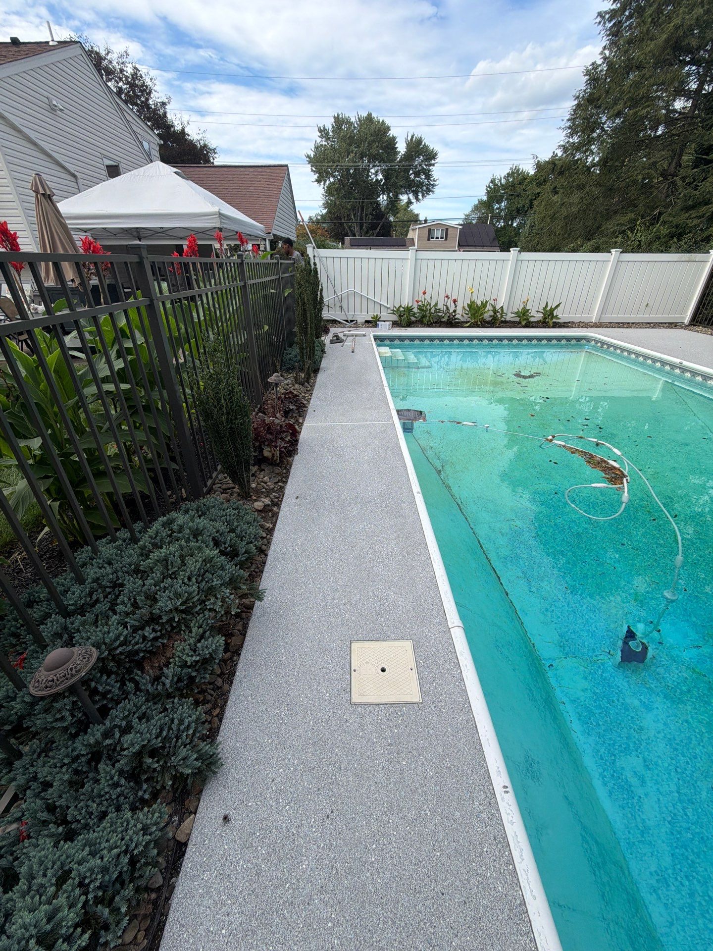 Blue Granite Pool Patio Concrete Coating in Lincoln Park by Spectrum Painting, LLC