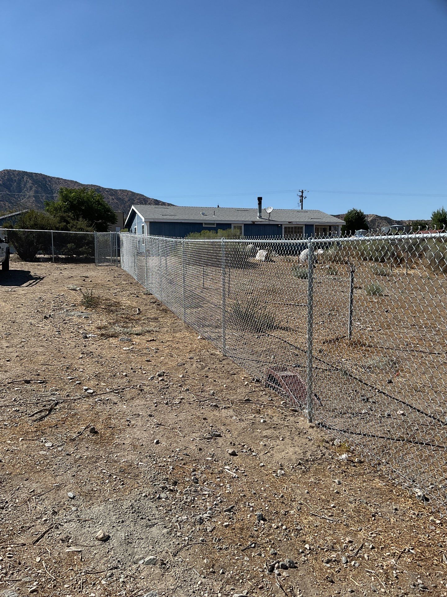 Fence Installation using chain -link by Fence Guys Inc.