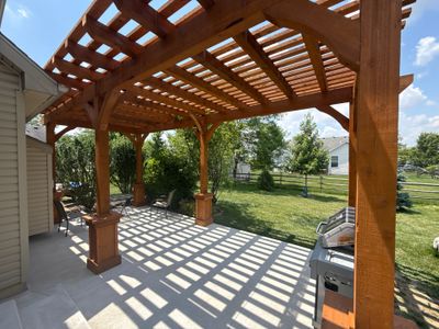 Custom Cedar Pergola and Concrete Patio Installation in Perrysburg