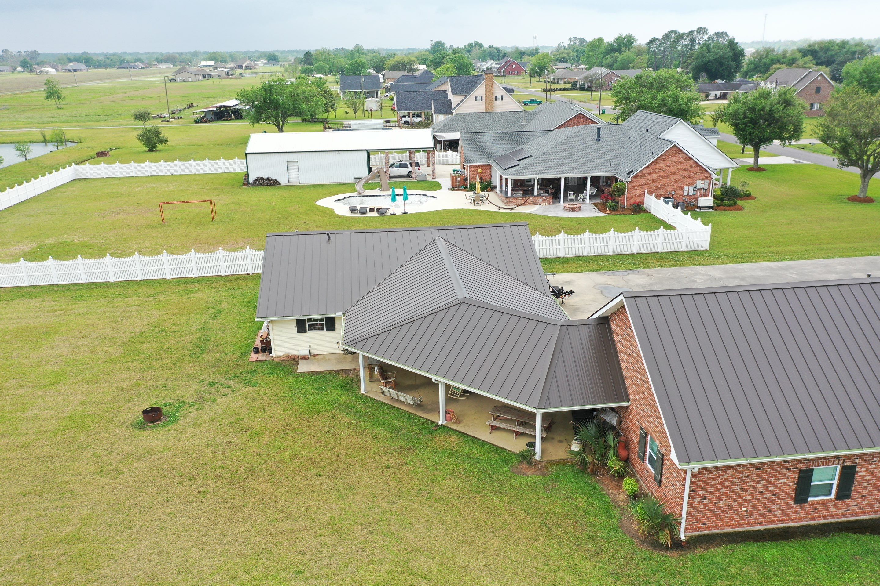Standing Seam Metal Roof Installation by Top Team Roofing & Construction