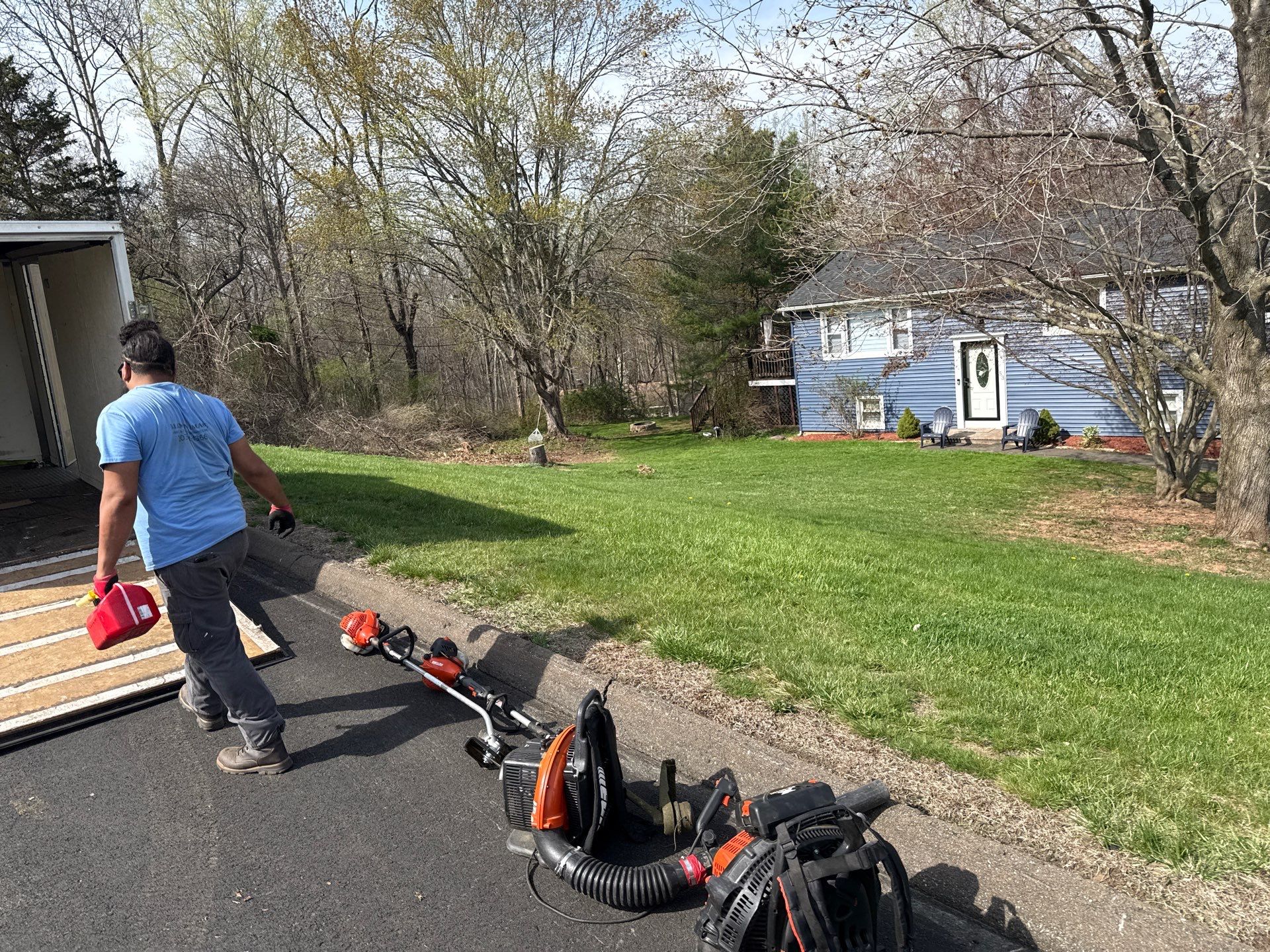 Lawn Care Visit at a Residential Property in North Branford, CT by Diamond Image LLC