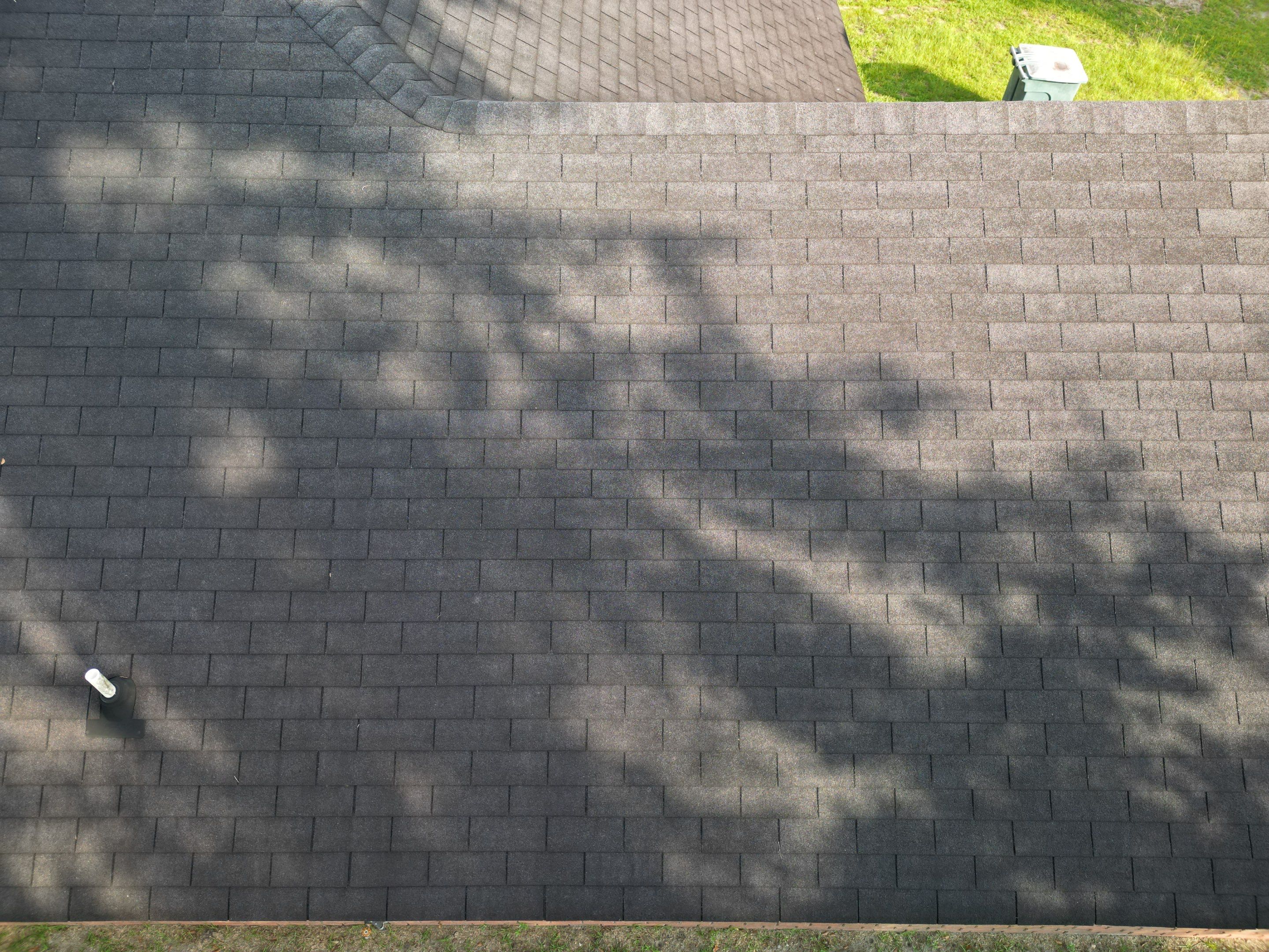 Residential Roofing Installation using Benton 26Ga 1inc Snapcock Metal Roof KYNAR Matte Black by Talya Roofing