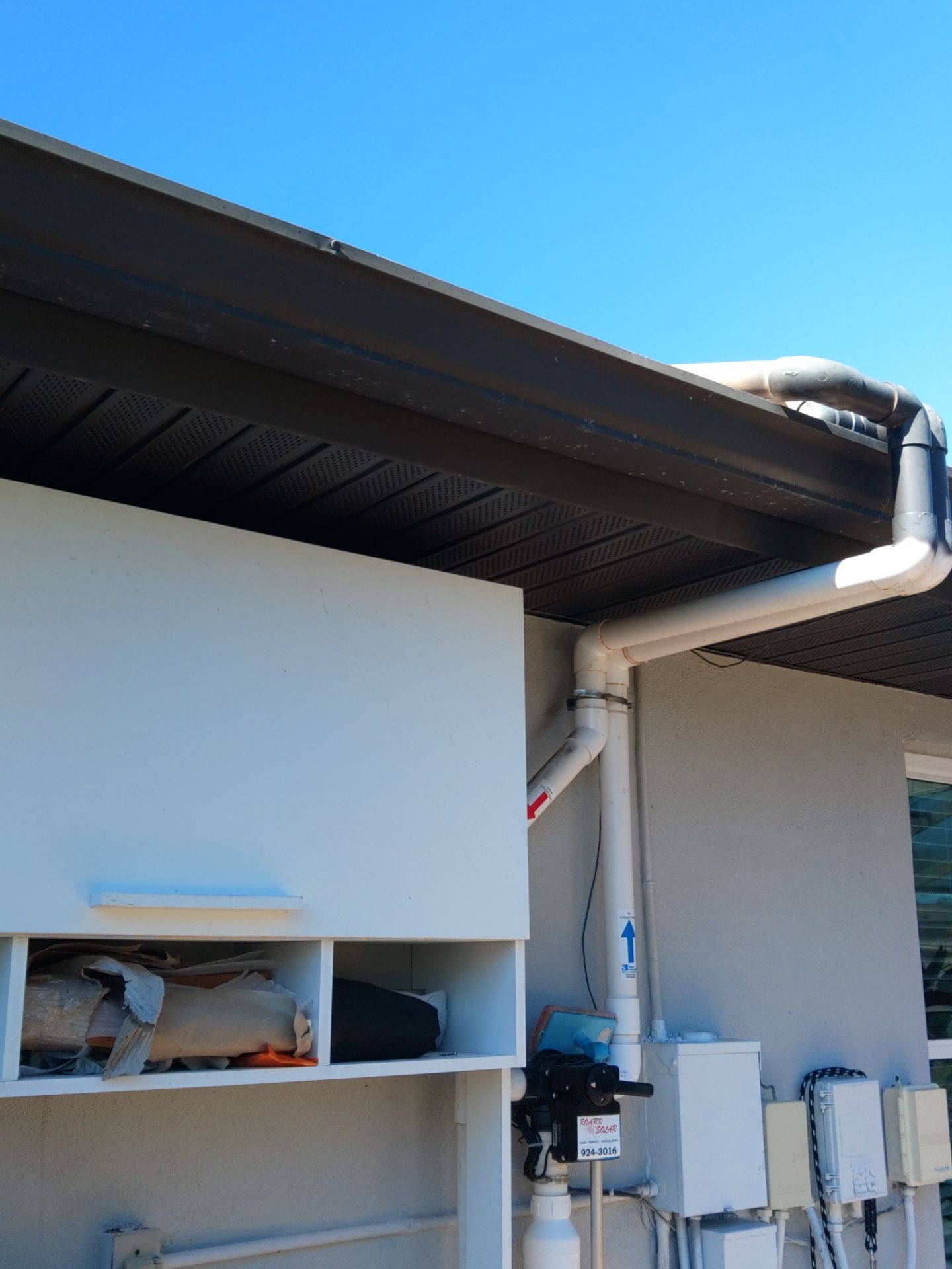 Dark Bronze Soffit Installation in Sarasota FL by Gutter Professors