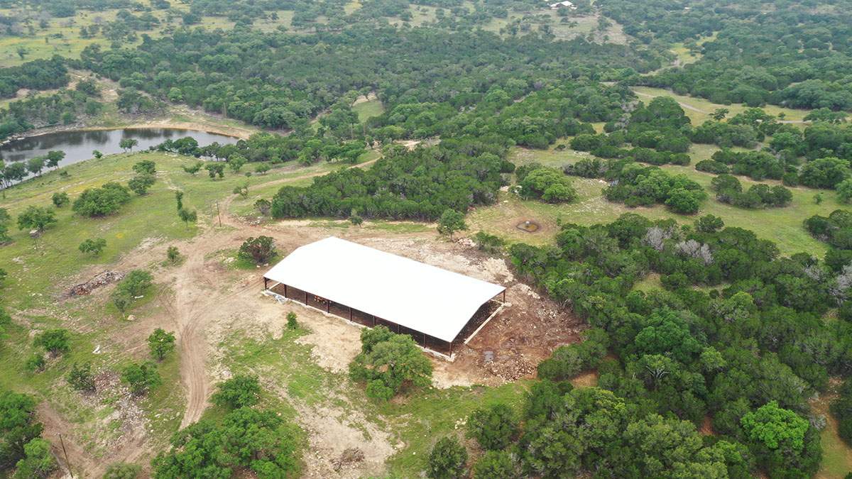 150K Equestrian center with 25K backup tank for potable water. by Hill Country Rain Water