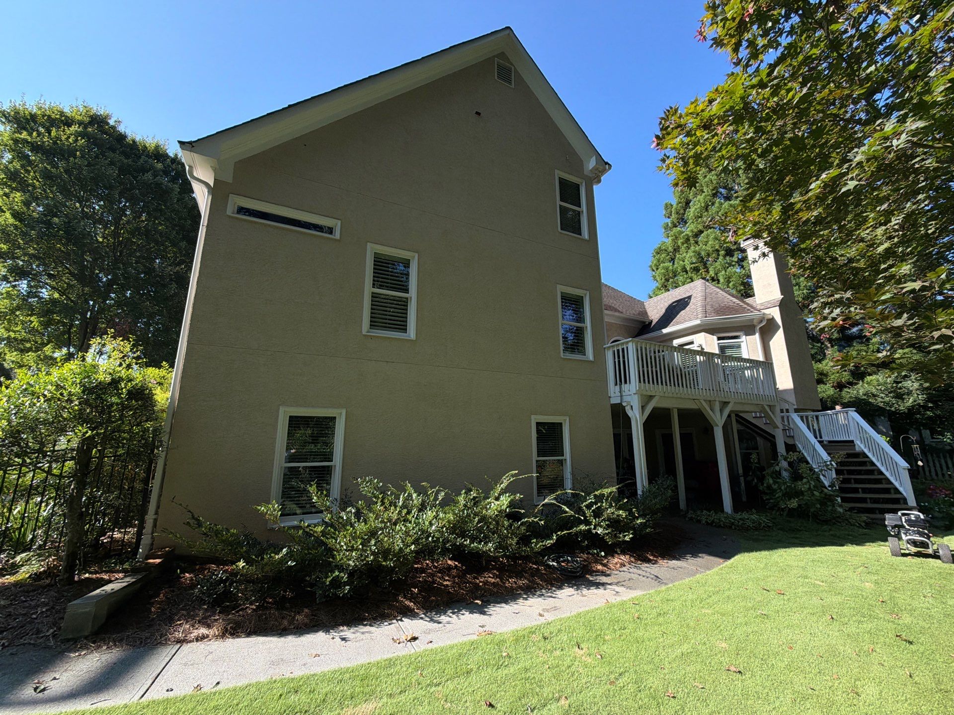 Multi-Story Stucco Home Exterior Painting and Garage Refresh in Marietta by Swift Home Renovations 