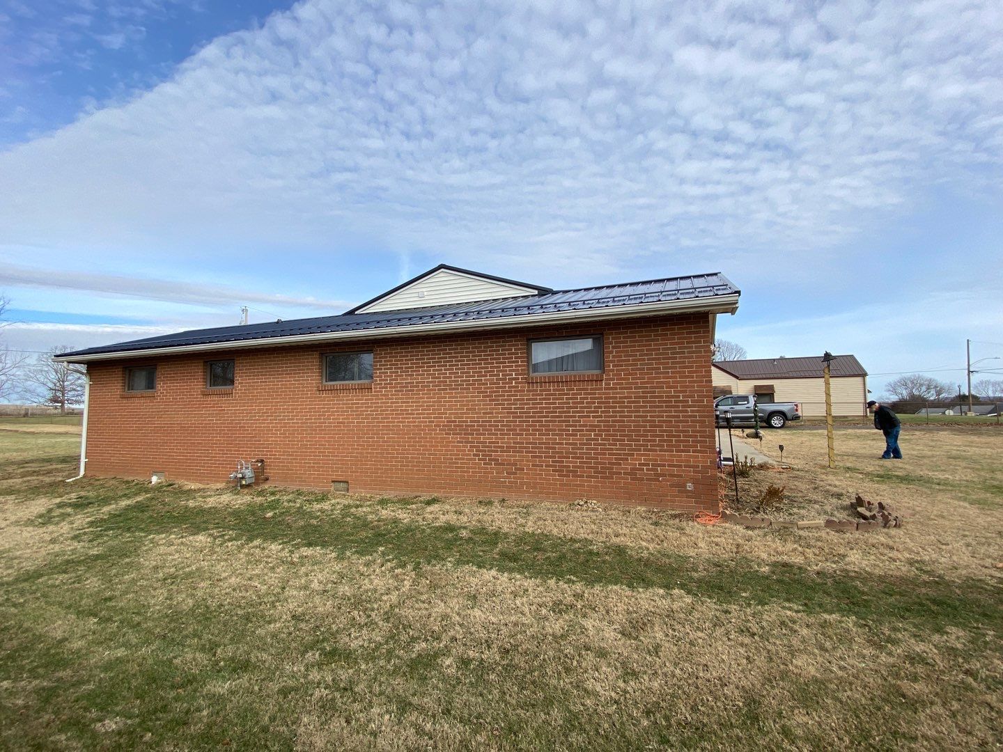 Residential Roofing Installation using Perfromance Panel Metal - Black by RoofX 