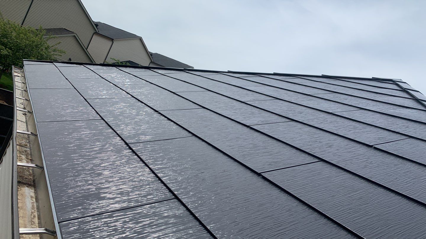 Tesla Solar Roof using Tesla Solar Roof V3 tiles by American Home Contractors