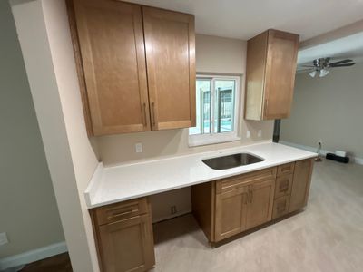 New Sandstone Cabinets with Quartz