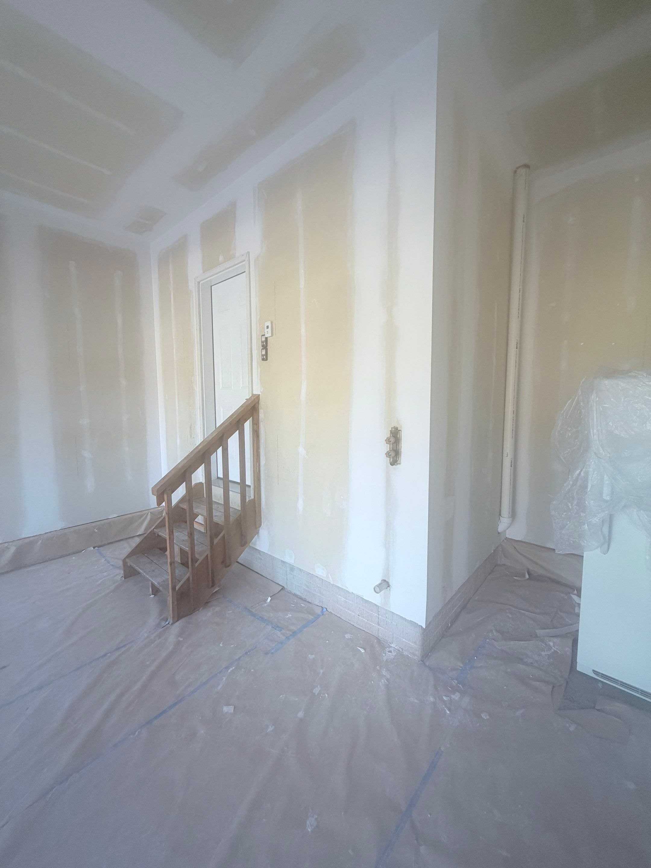 Full Garage Interior Drywall Finishing and Priming in Sioux Falls by Select Painting, Coatings & Garage Cabinets