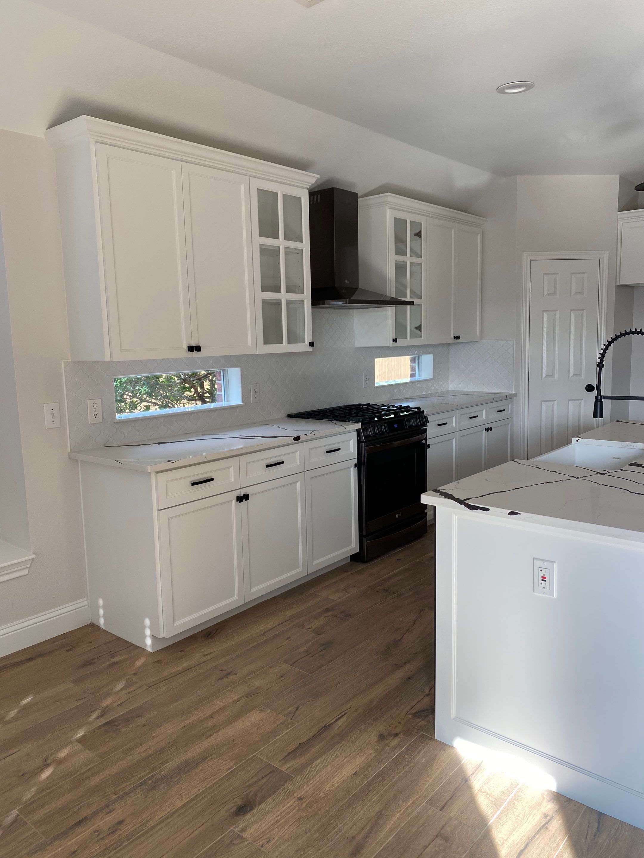 Custom cabinetry Kitchen Remodel by SLM General Contractors & Roofing