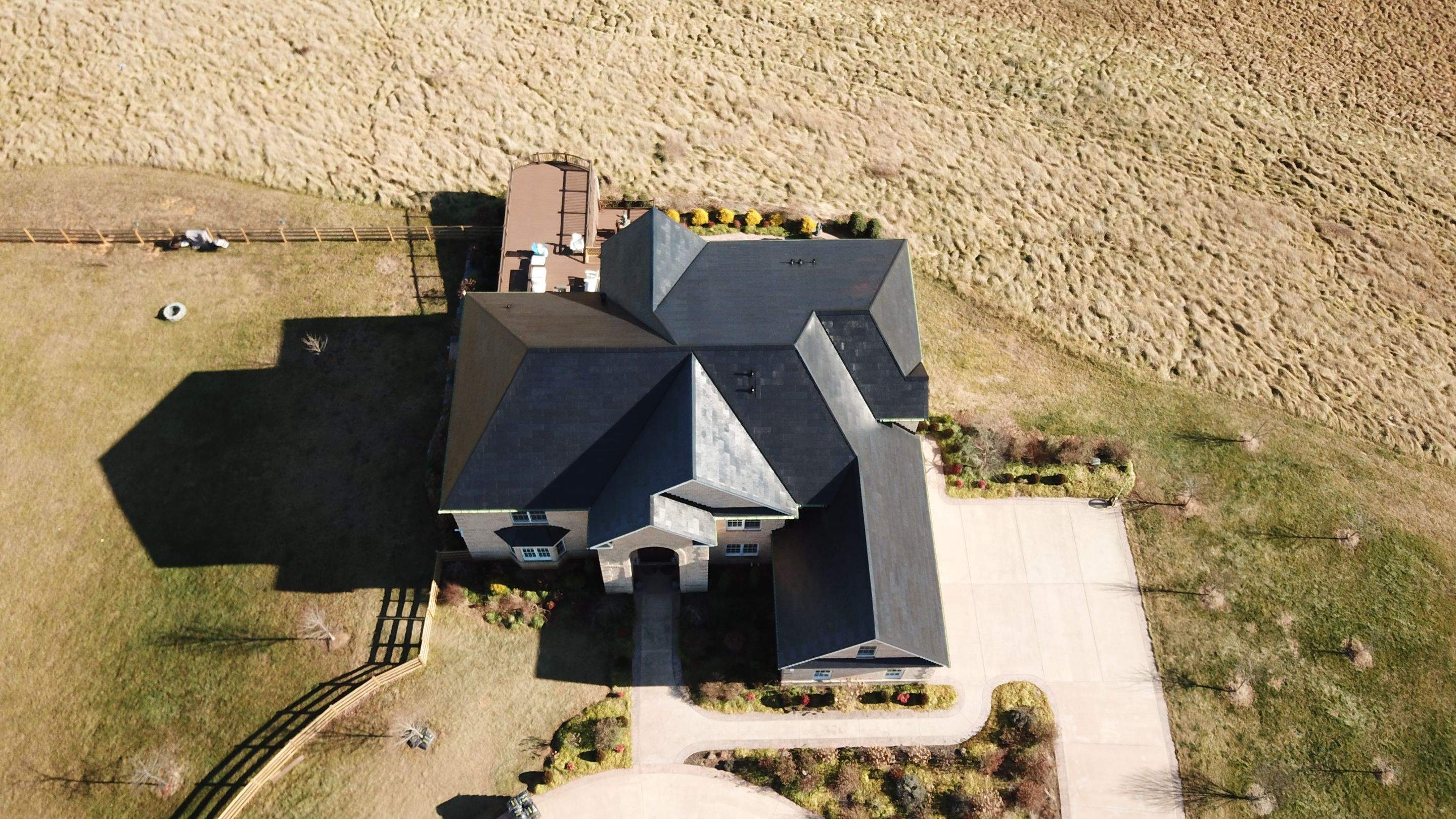Tesla Solar Roof Replacement by American Home Contractors