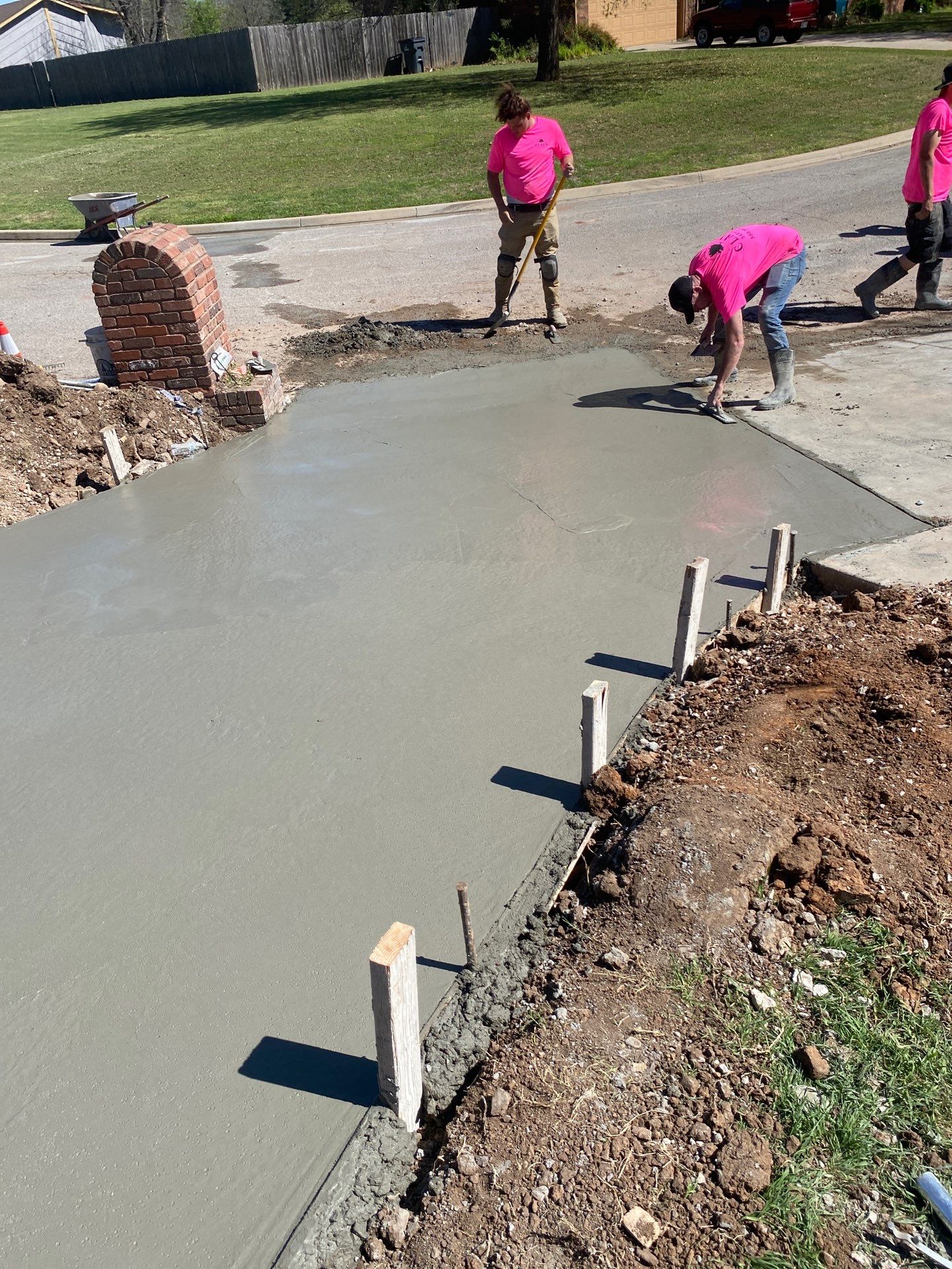 Concrete Driveway and Fence by Clays Services Inc