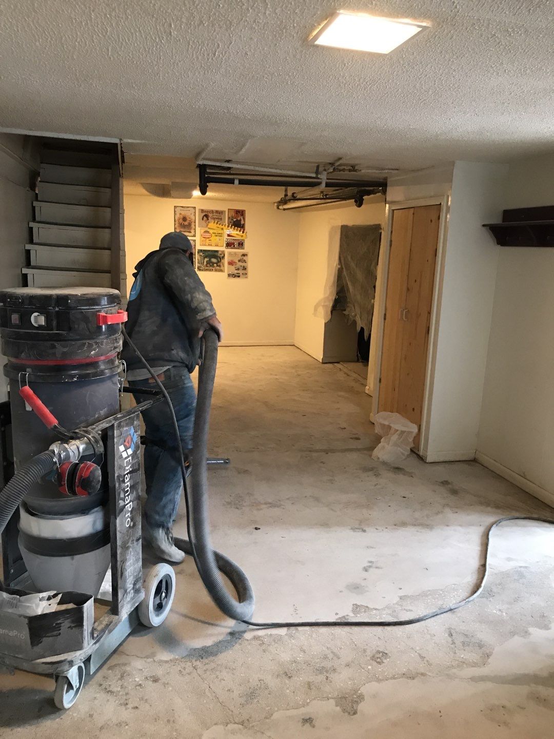 Basement using Driftwood by Select Painting, Coatings & Garage Cabinets