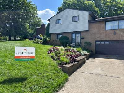 Horizontal Vinyl Siding Installation for Pittsburgh Split-Level Residence