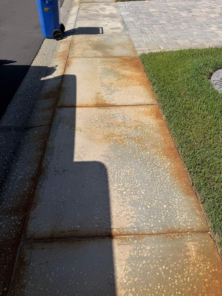 Professional Rust Removal for Concrete Sidewalk in Sun City Center by Supreme Paver Experts