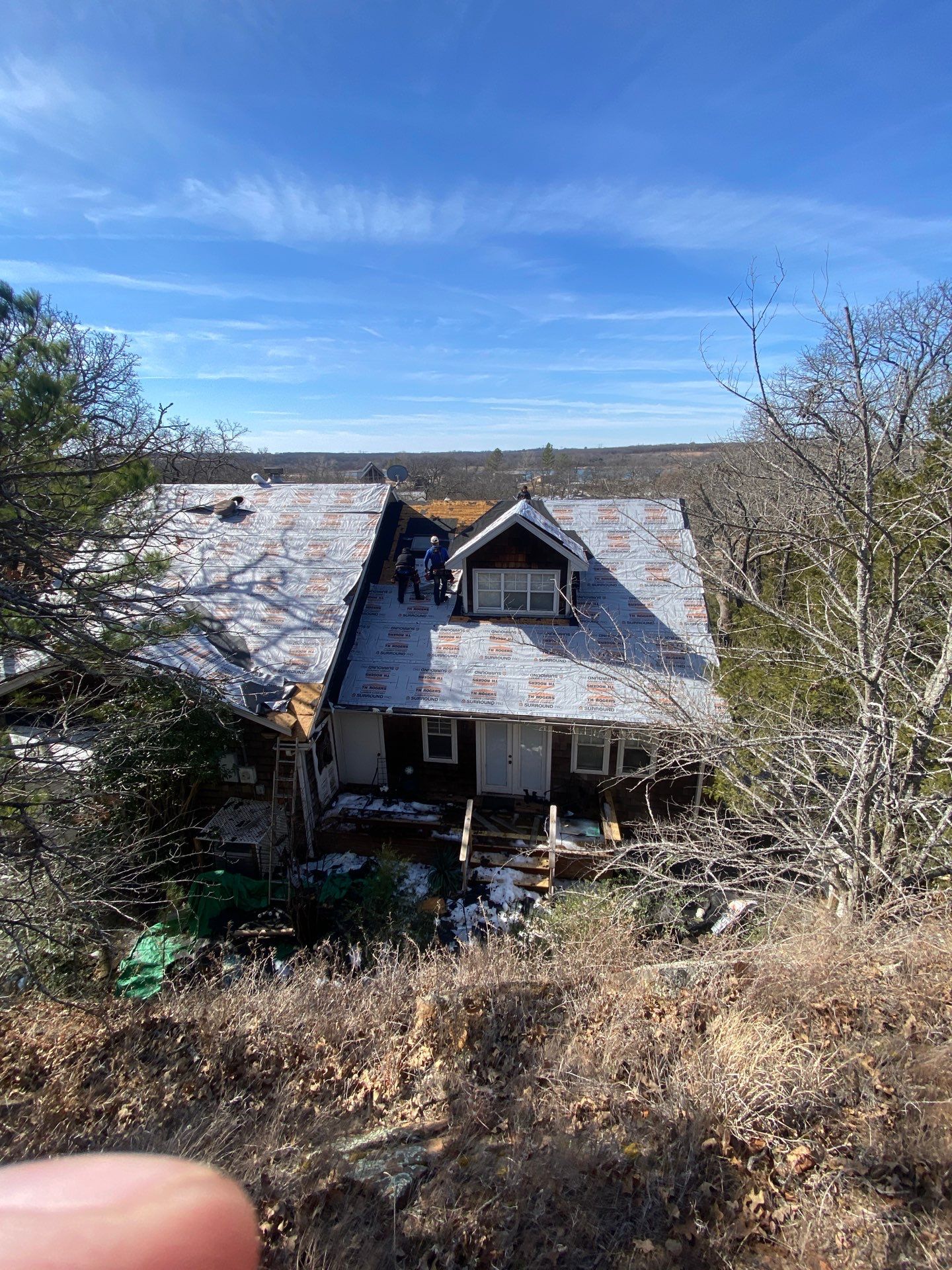Roof Replacement on a private lake near Ardmore by BANA Roofing and Solar Supply