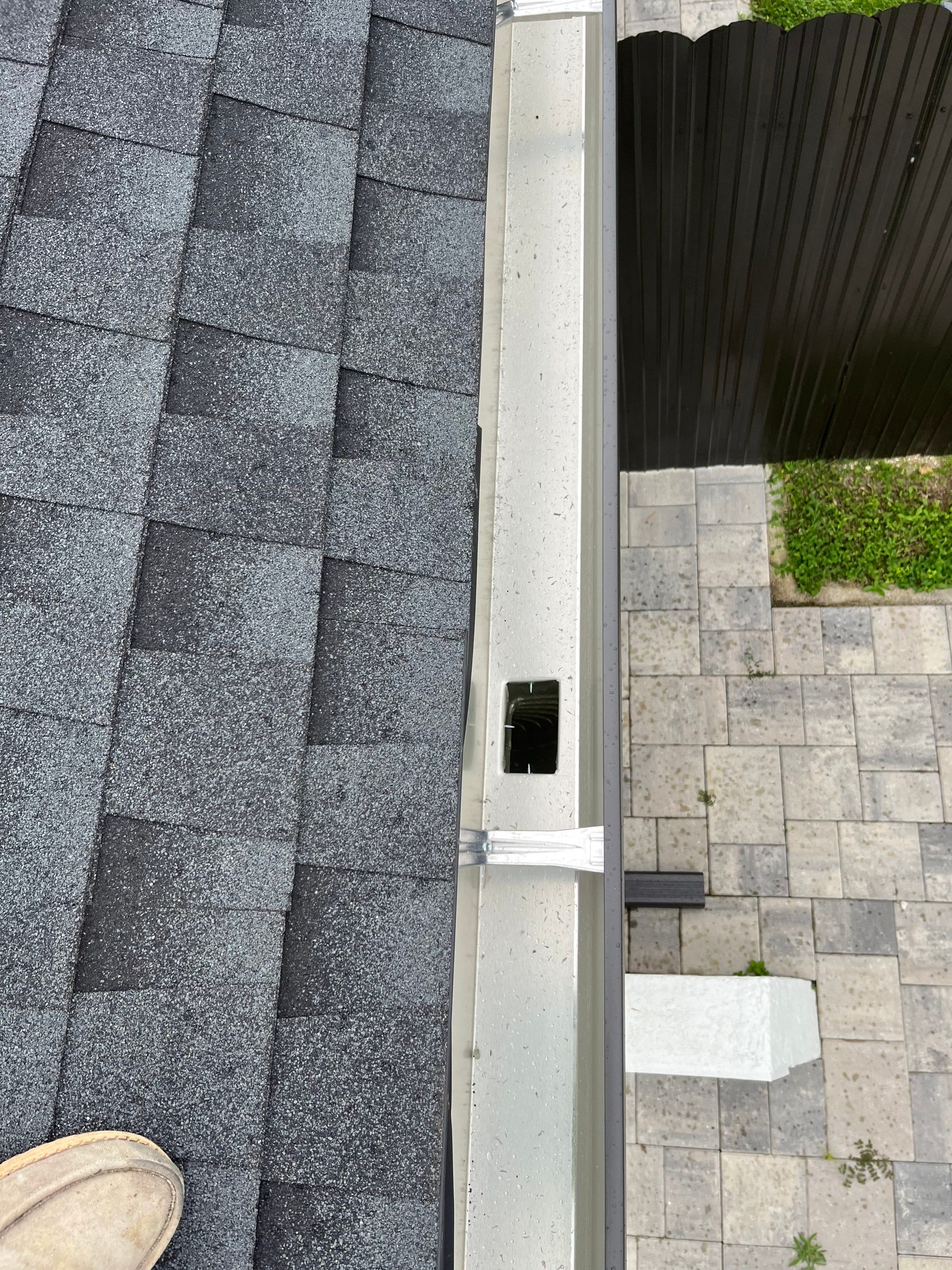 Black Seamless Gutters for a Modern Look in Cape Coral FL by Gutter Professors