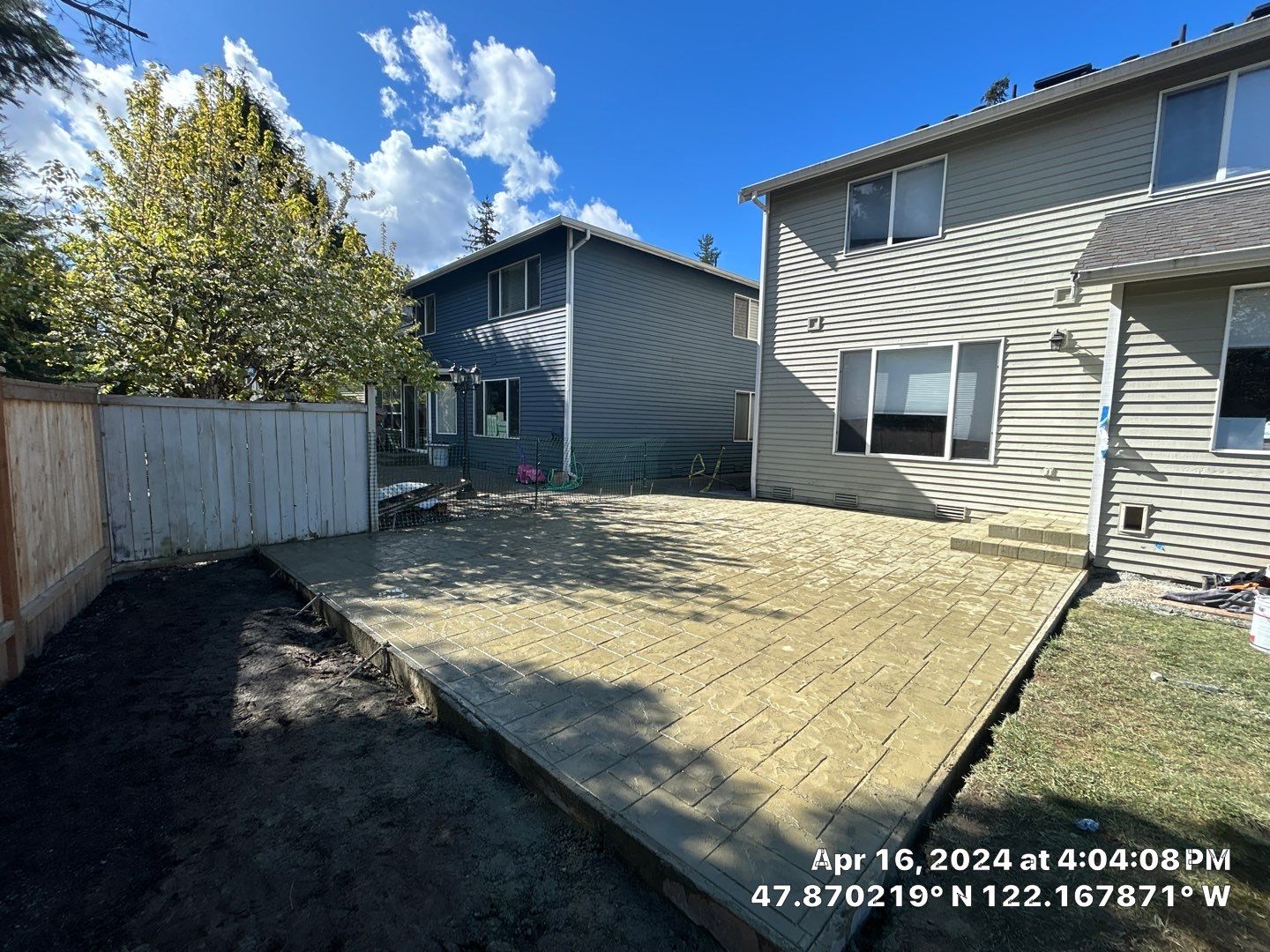 Benedict | Stamped Concrete Back Patio by Jireh Asphalt & Concrete Inc 