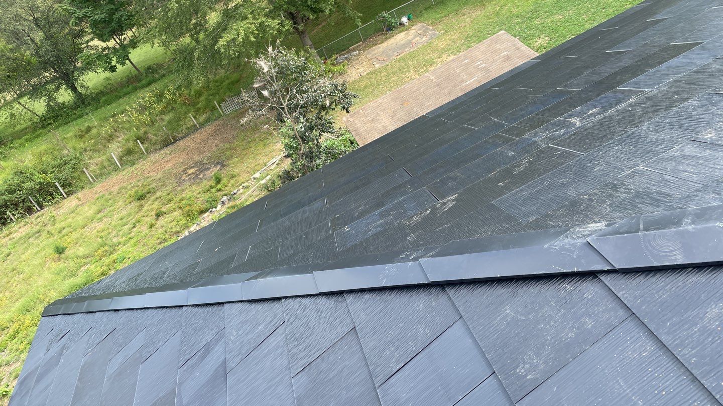 Tesla Solar Roof  using Tesla Solar Roof V3 tiles by American Home Contractors