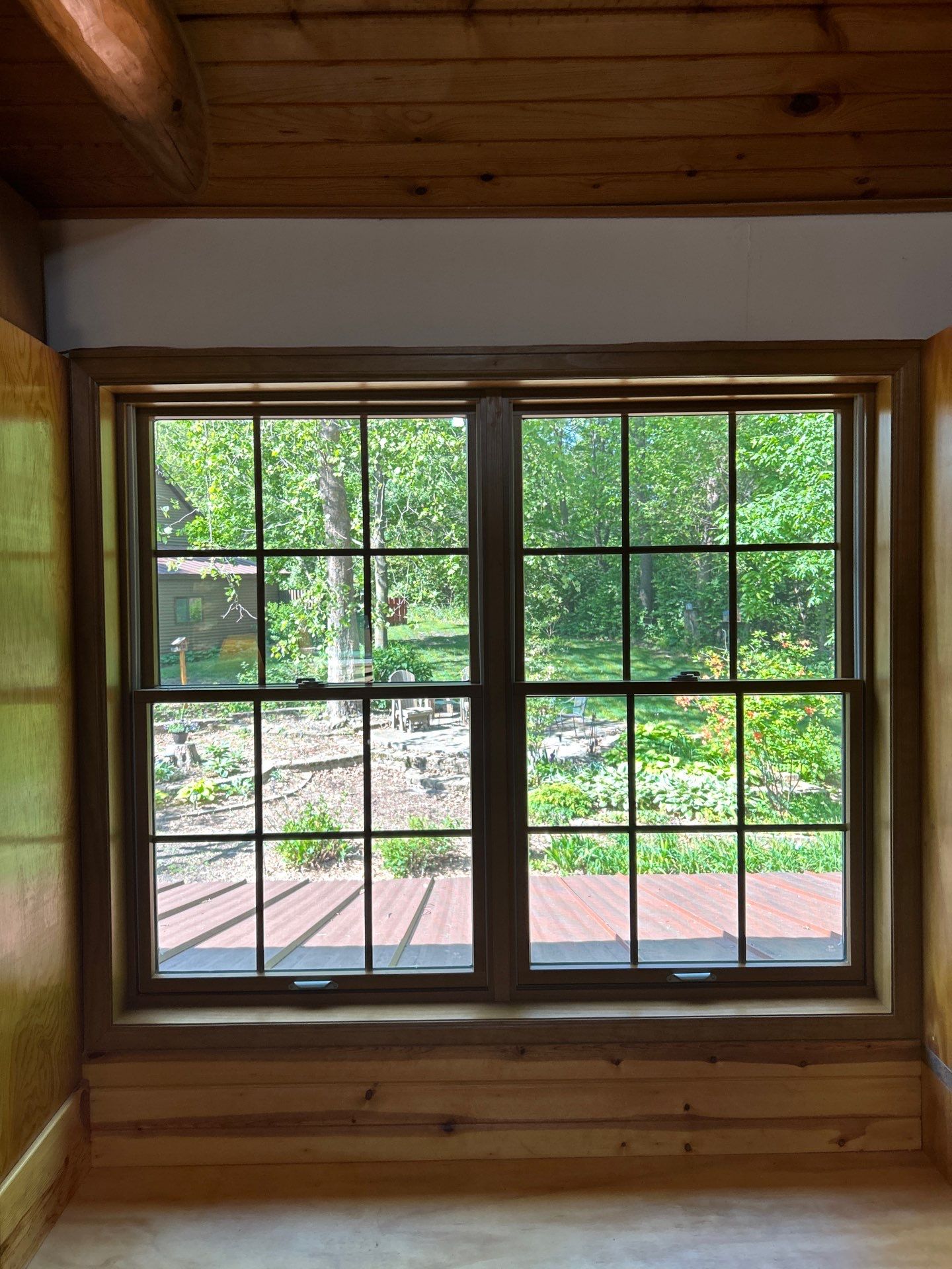 Pella Window installation using Pella Lifestyle wood/Aluminum window by United Windows and Siding LLC