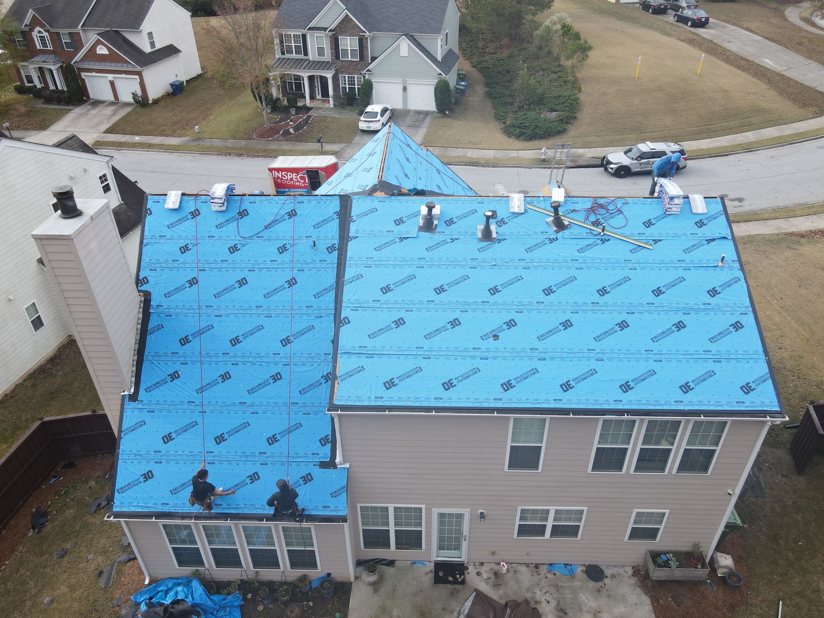 Residential Roofing Installation using Timberline HDZ Hickory  by Inspector Roofing and Restoration