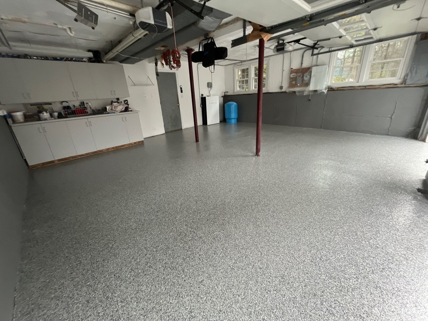 Maestranzi Garage TransFLOORmation by Symphony Concrete Coatings