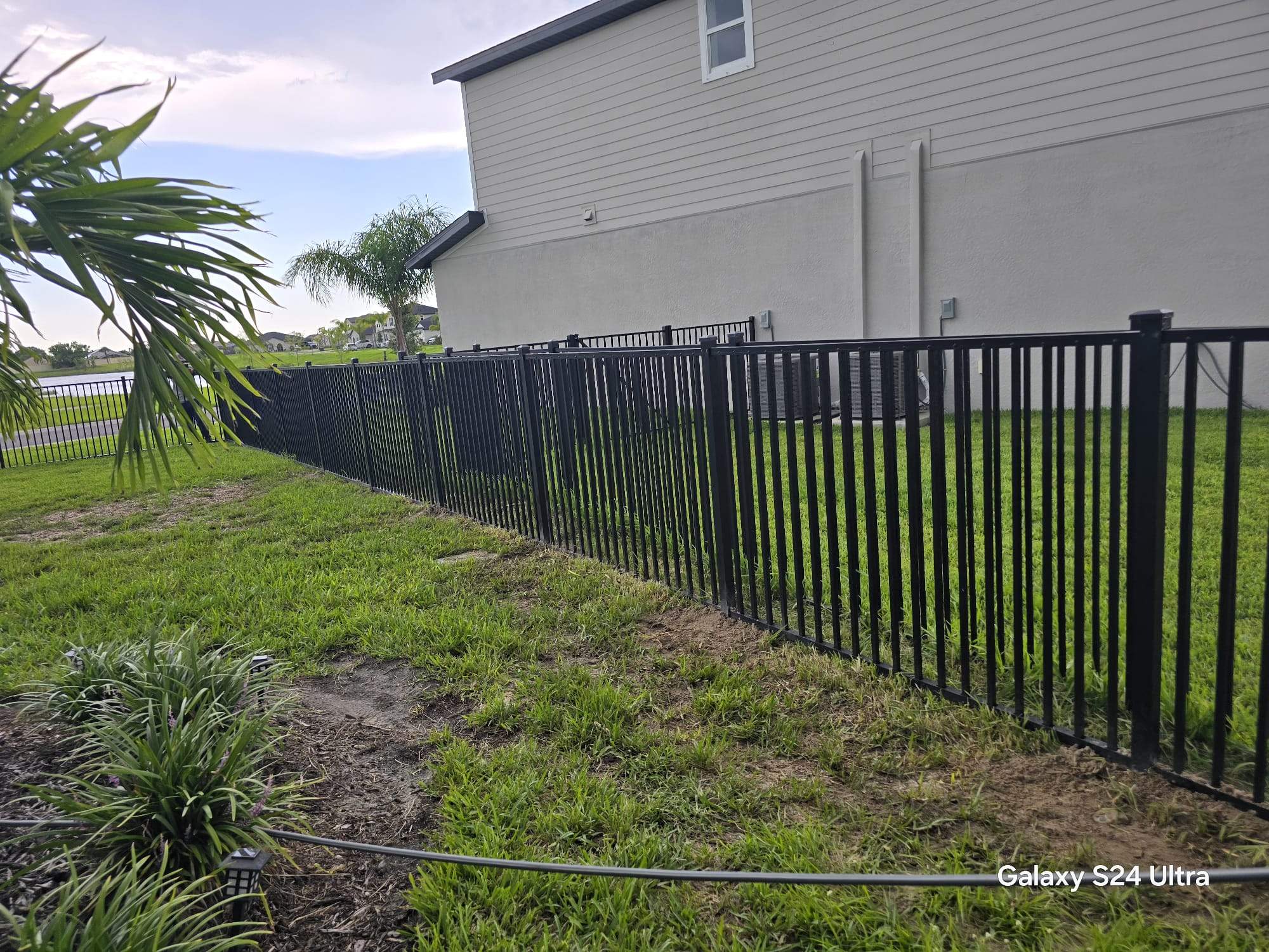 Black Aluminum Picket Fence Installation in North Fort Myers by True Fence LLC