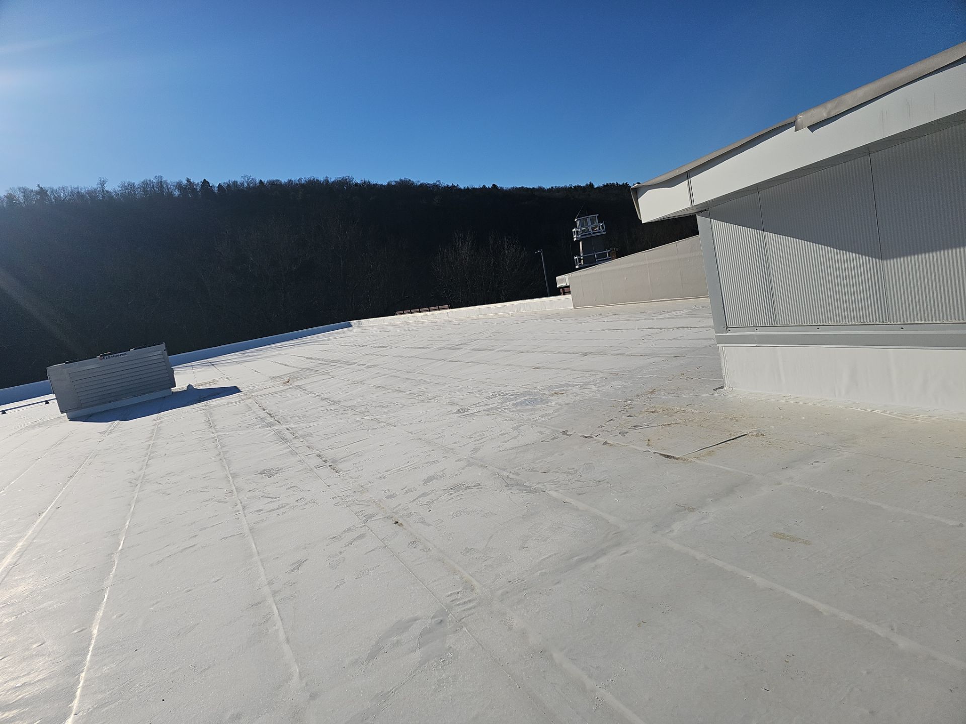 Commercial Roofing Installation using Insulated roof and wall panels by Nitro Roofing and Construction