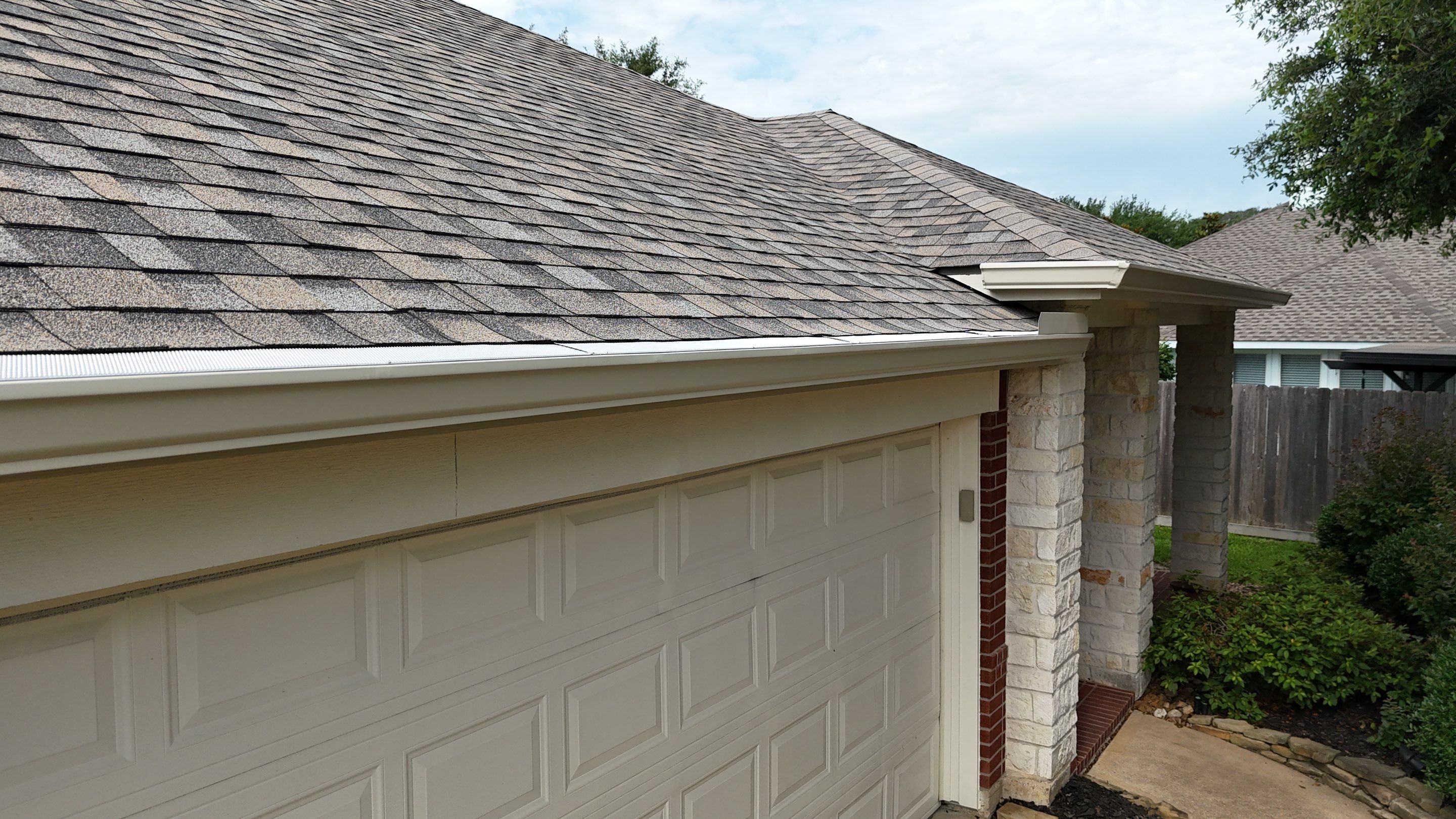 Residential Roofing & Gutter Installation using IKO Dynasty by Core Four Roofing