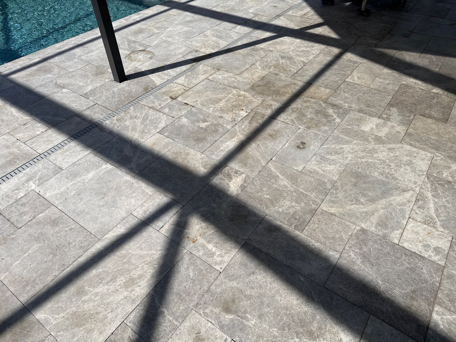 Travertine Pool Deck, Lanai & Screen Enclosure Cleaning Near Manatee River | Bradenton, FL by Sunshine AquaWash