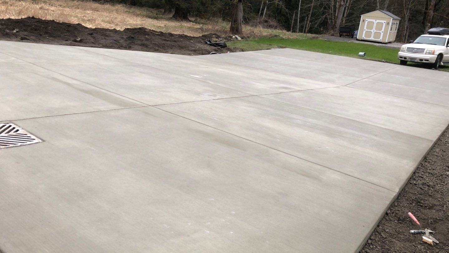 Mandy | Stamped Concrete Patio & Driveway by Jireh Asphalt & Concrete Inc 