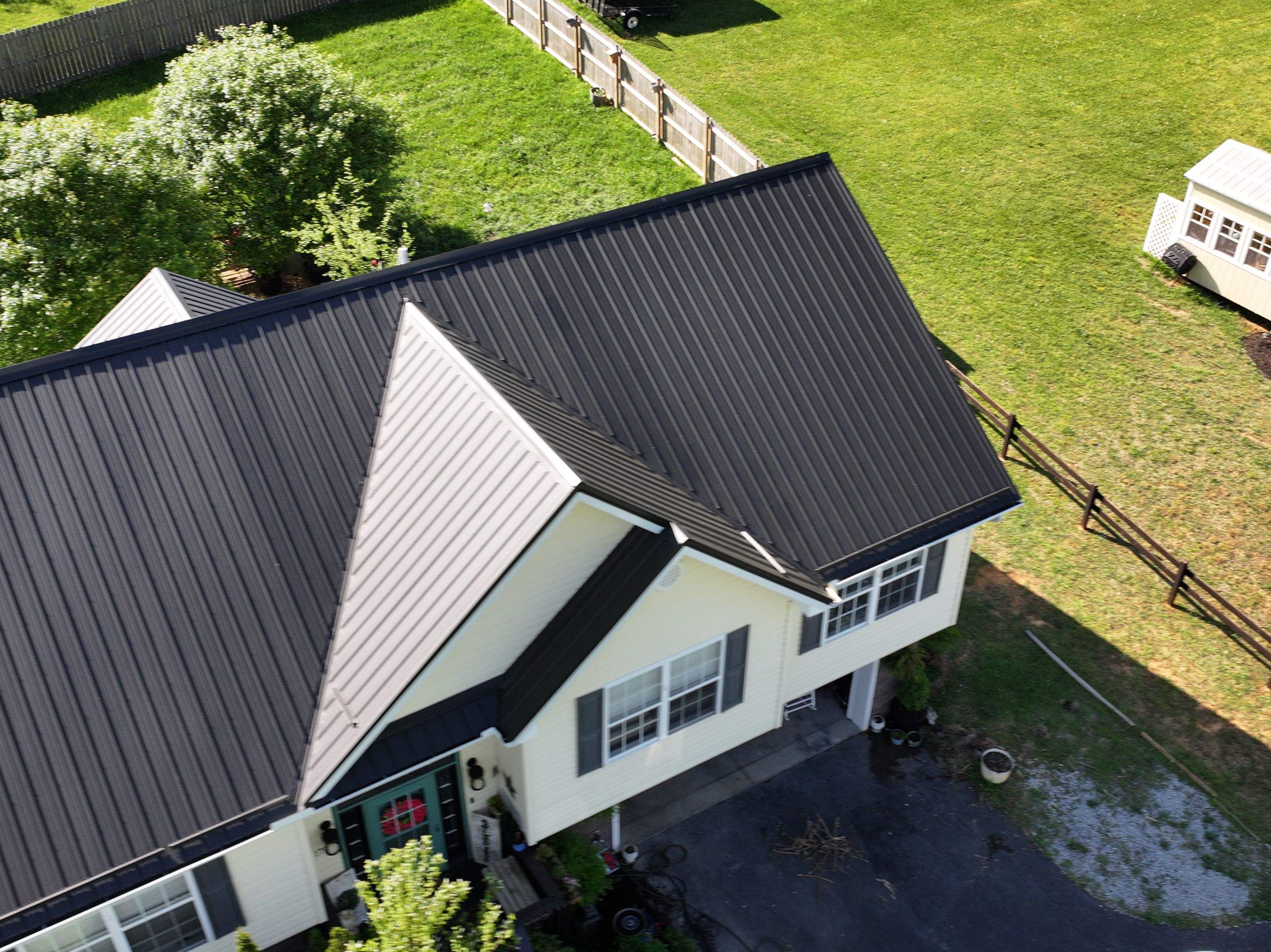 Stone Residence  by Omnia Roofing