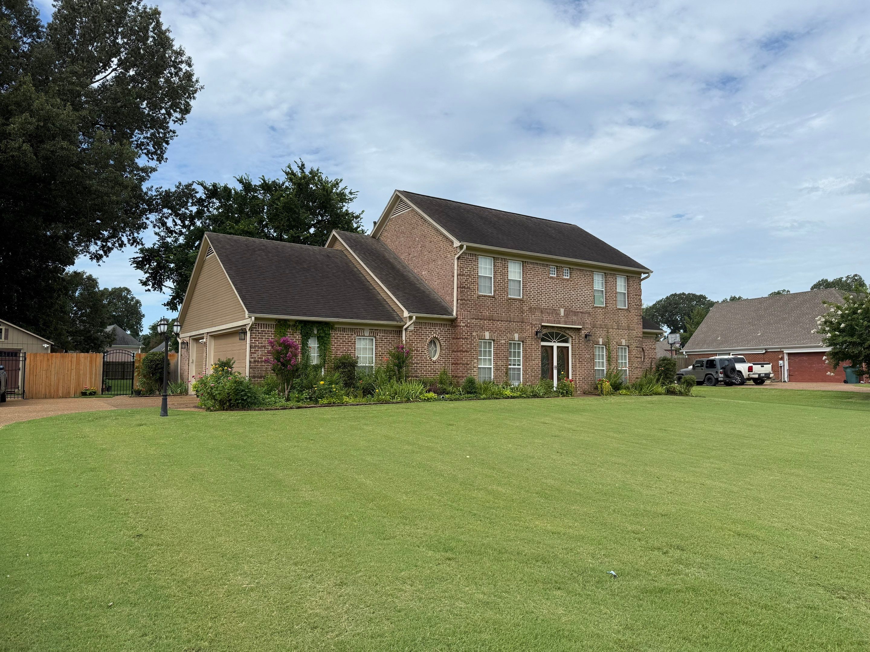 Full Residential Roof Replacement for Southaven Brick Colonial Home by Revival Roofing Services