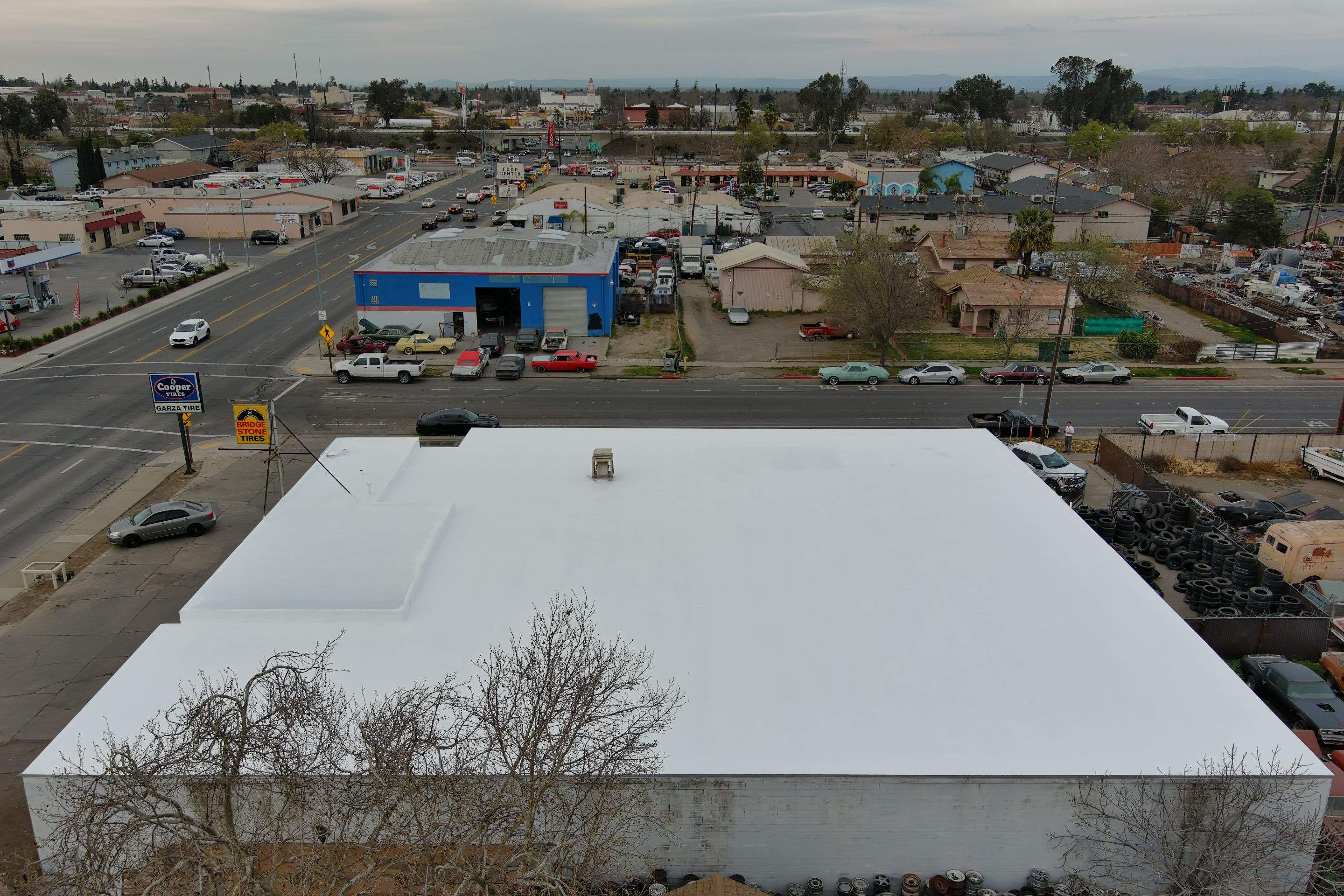 Spray foam and coatings using Conklin Benchmark/PUMA XL coatings and spray foam by Straight Edge Roofing Inc